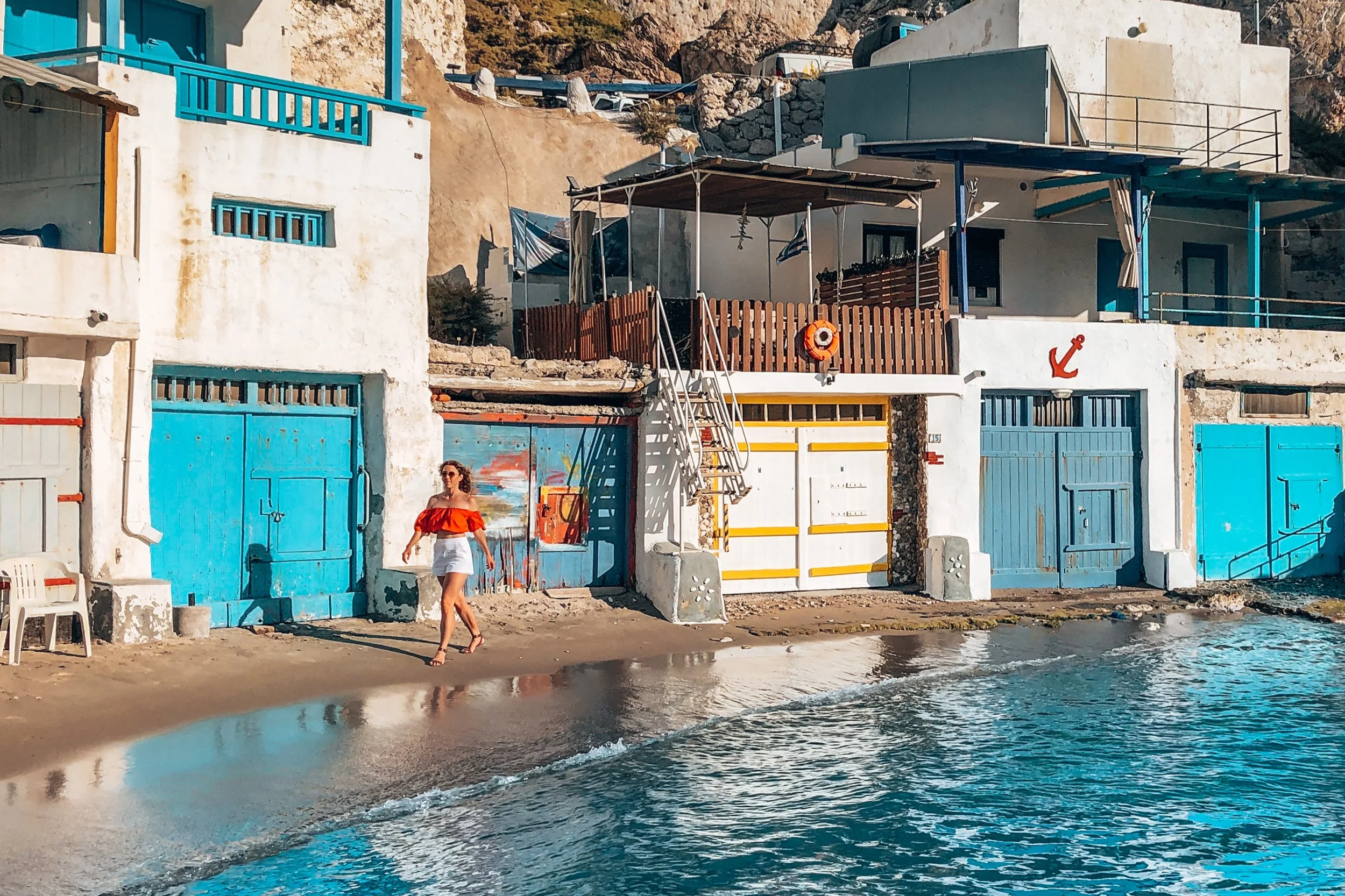 Walking along the waterfront in Milos, Greek Islands