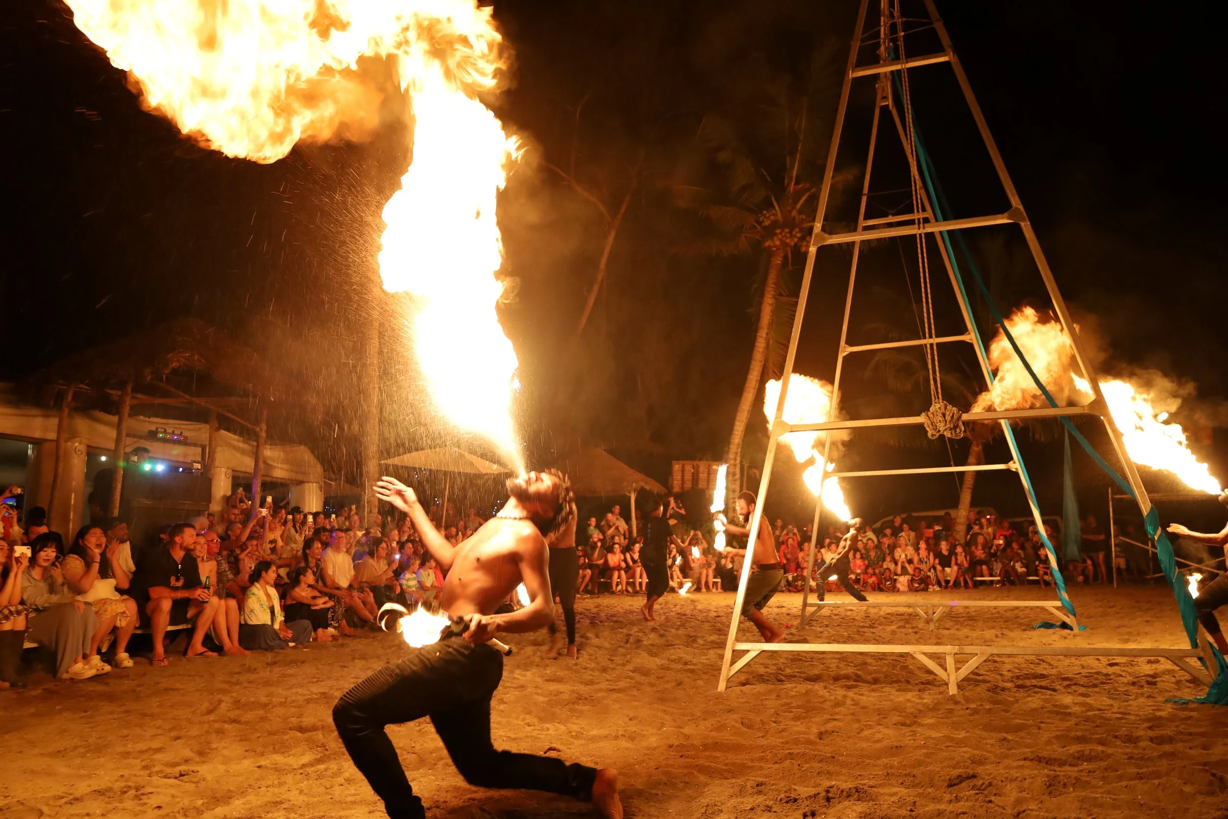Breathing fire at the fire show at The Beach Bar in Vanuatu