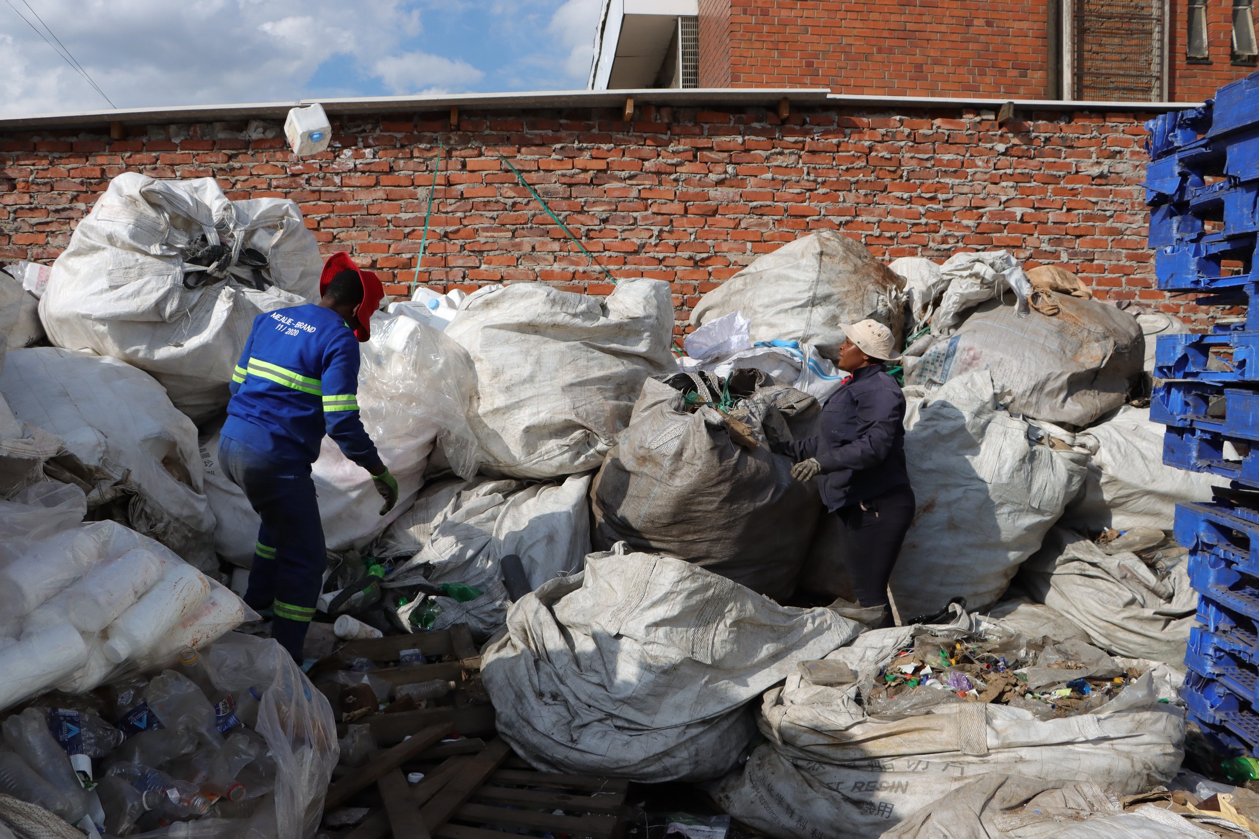 Two women sorting waste at Recycling Ladies Premises 