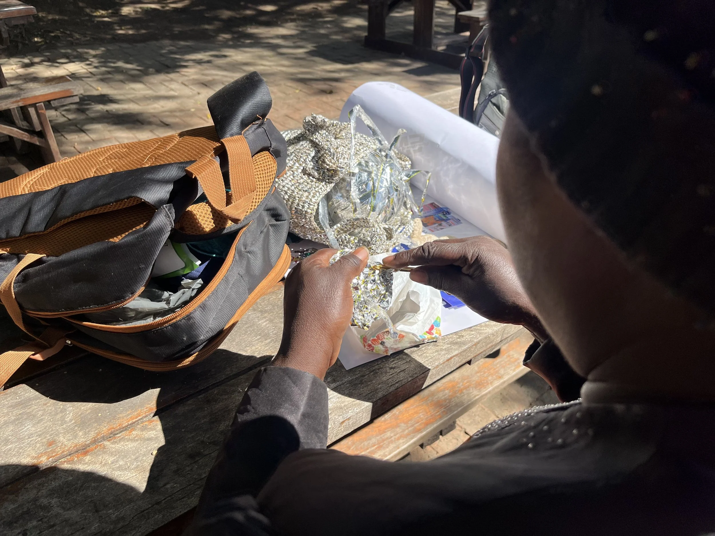 She makes bags, crafts and jewellery from recycled and collected materials 