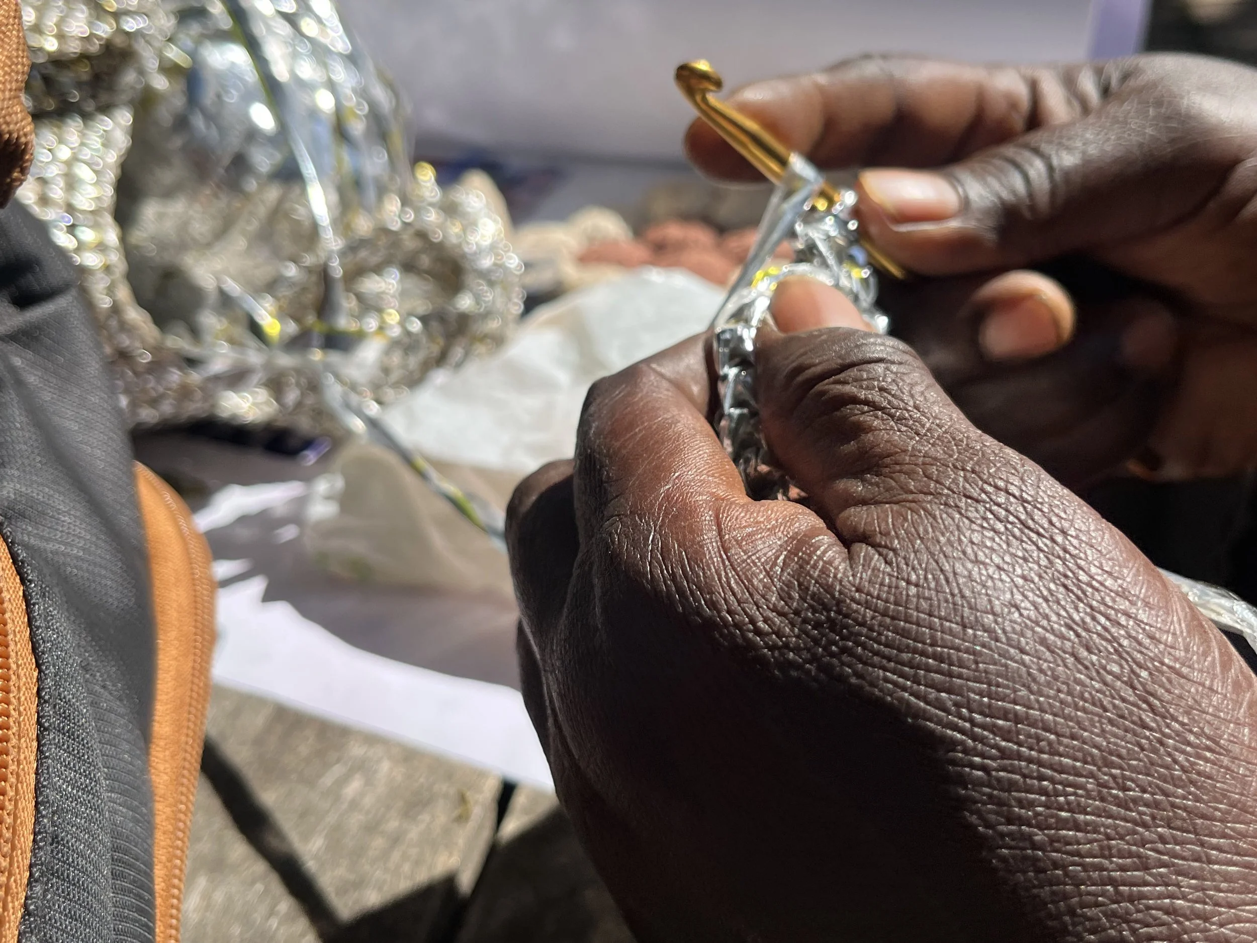 Eunice Crocheting the bag 