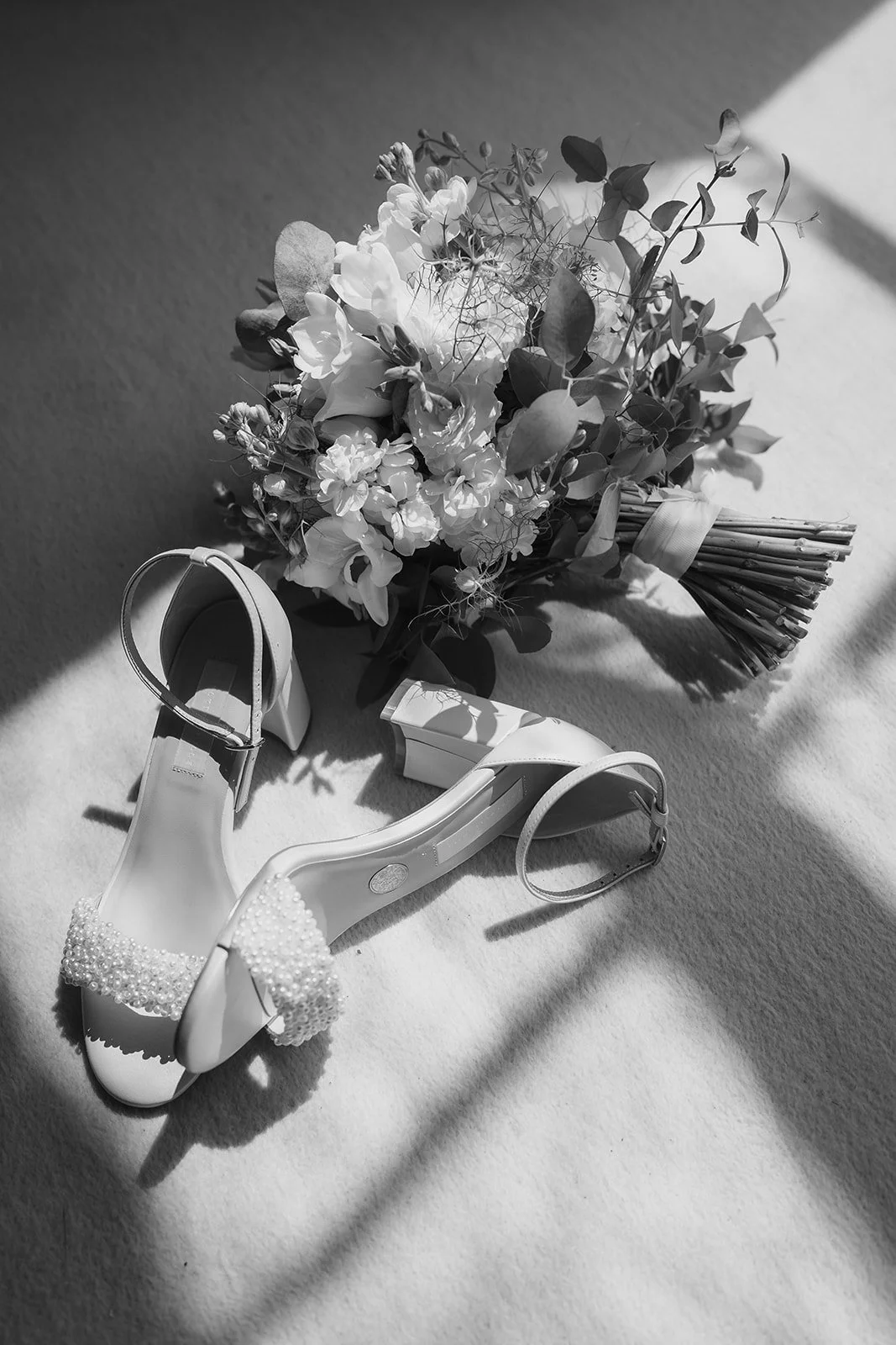 flat lay of shoes and flowers at north cadbury court