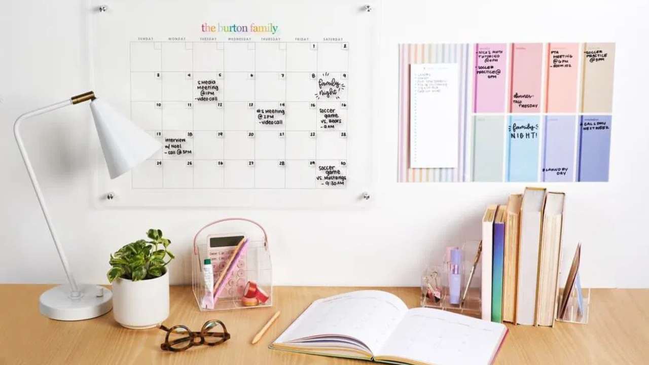 Organized workspace with laptop, planner, and notebook representing business systems that build trust and clarity for entrepreneurs.