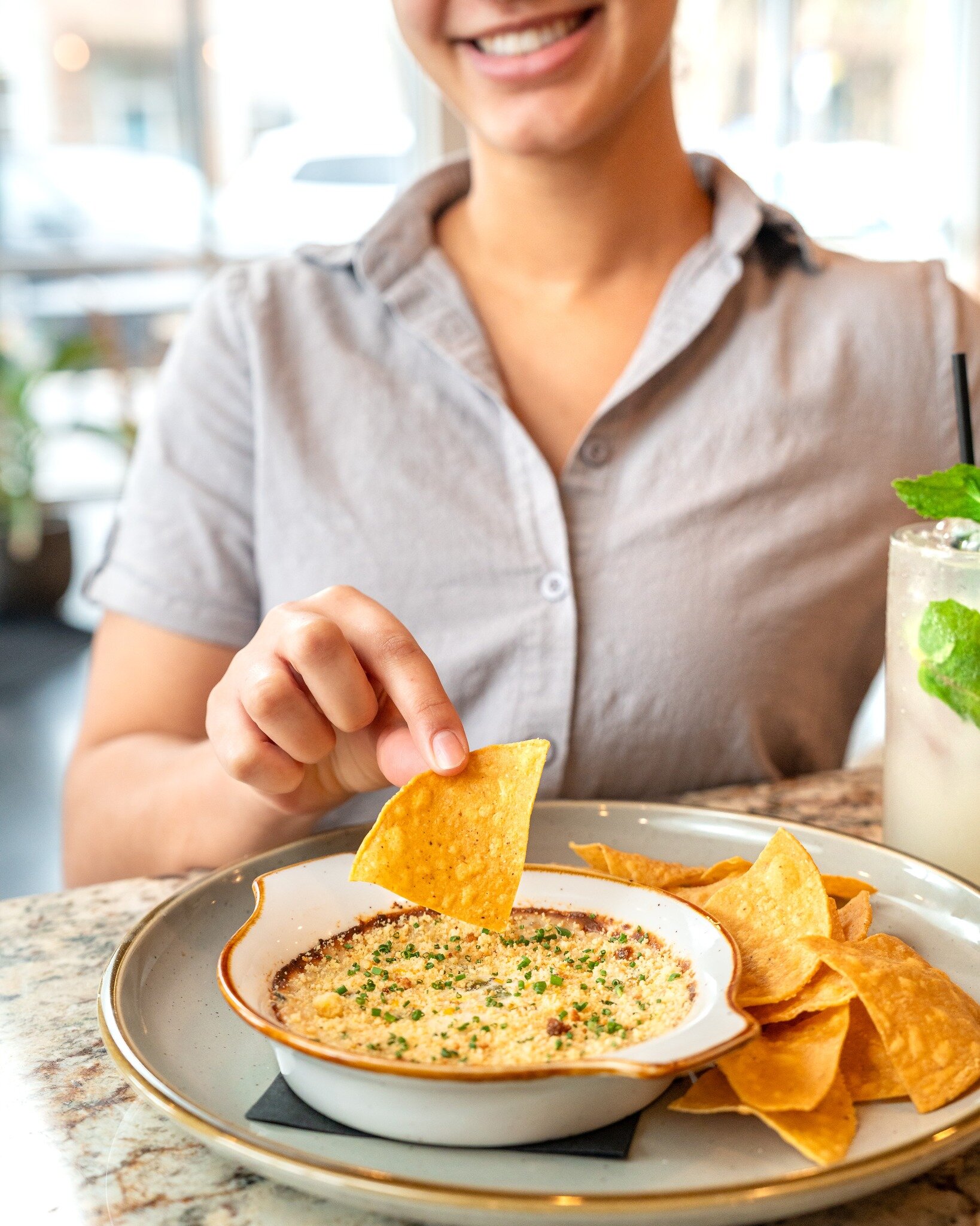 A fan favorite amongst guest and staff alike, enjoy our Grilled Jalape&ntilde;o Corn Dip for Happy Hour this weekend! This best-seller is a mixture of grilled corn, charred jalape&ntilde;os, chives, and a cornbread crumble. We just can't say enough a