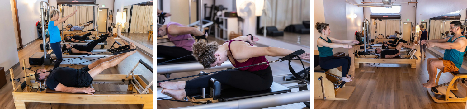 People participating in a Pilates class in a fitness studio, lying on Pilates reformer machines, guided by instructors.
