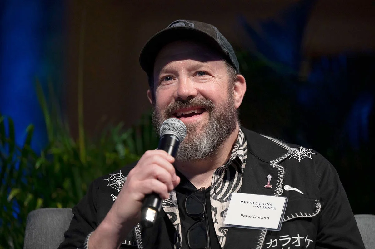 Artist, educator and graphic recorder, Peter Durand, speaking on a panel at the Revolutions in Science Dinner at the National Museum of Natural History.