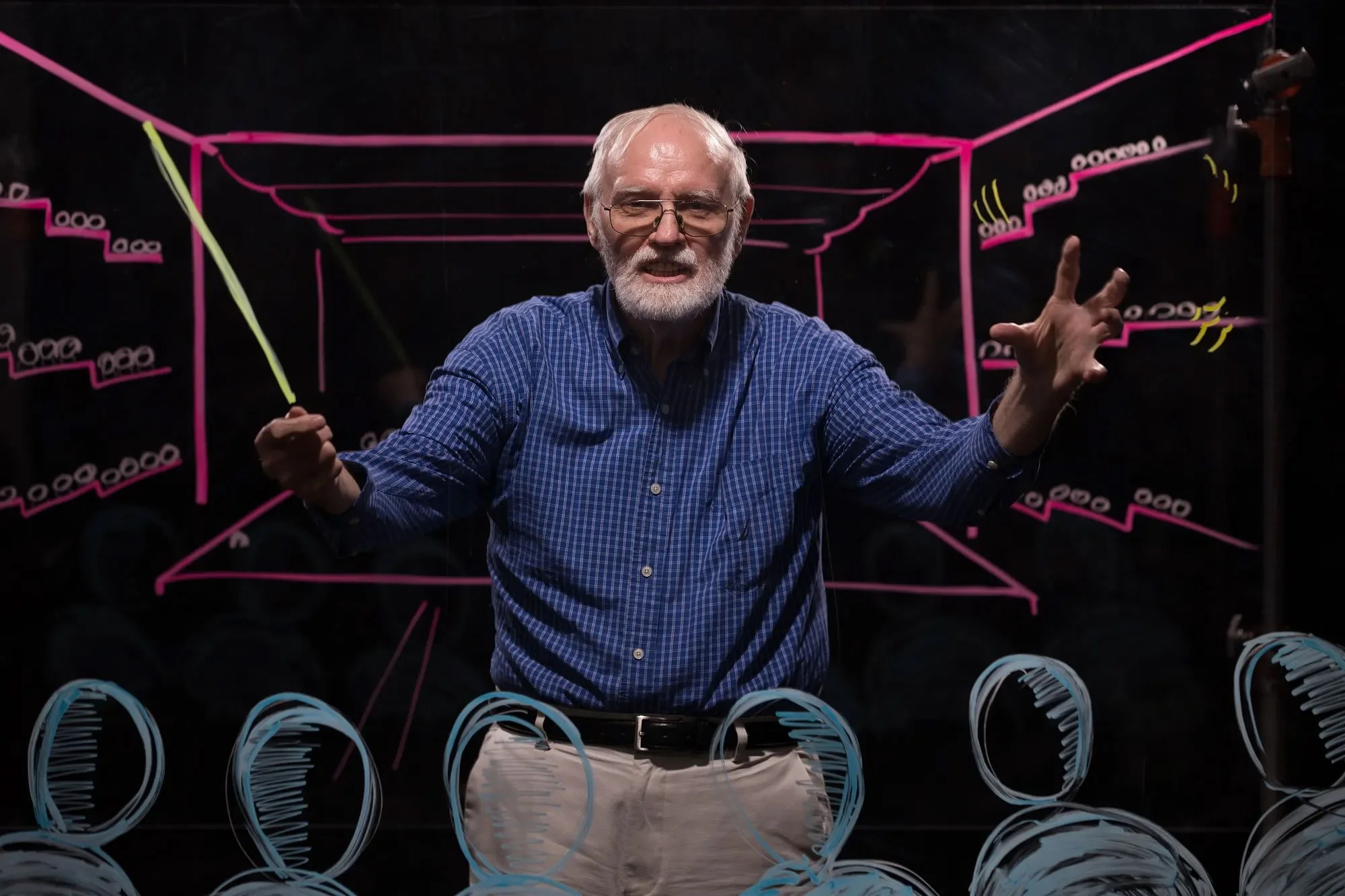 Conductor John Quinn portrait by Asa Mathat.