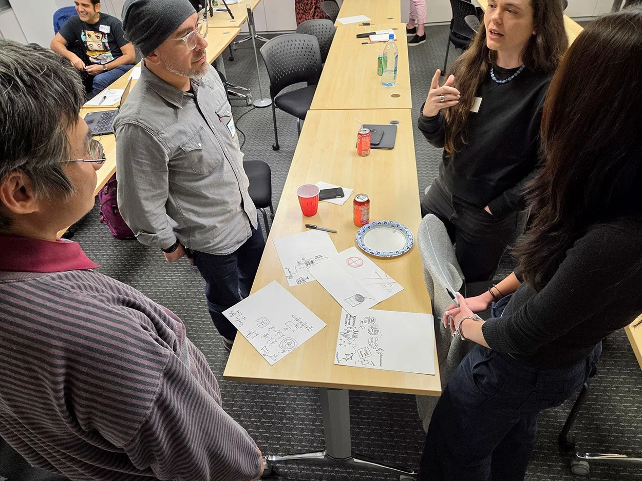 Four participants share their personal maps drawn to show "How I got here?" as part of a networking event.