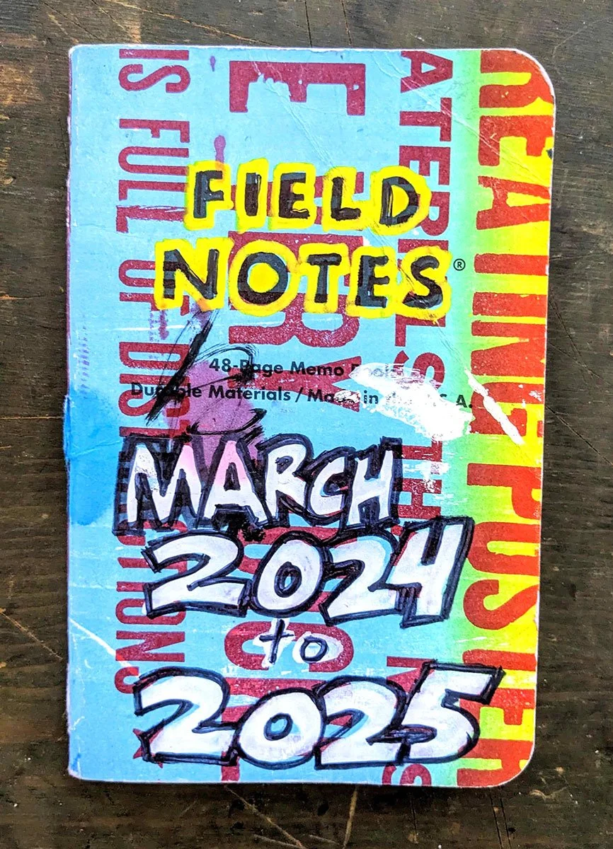 A photo of the coloful cover of Peter Durand's personal Field Notes pocket notebook.