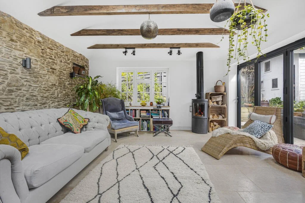 Wooden beams and bare brick feature wall