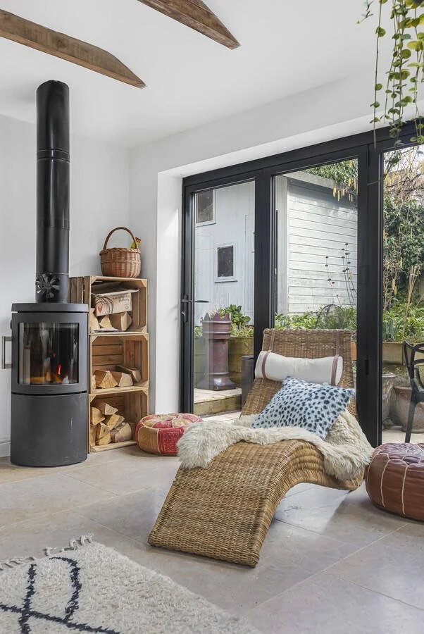 Wood burning stove in living room extension