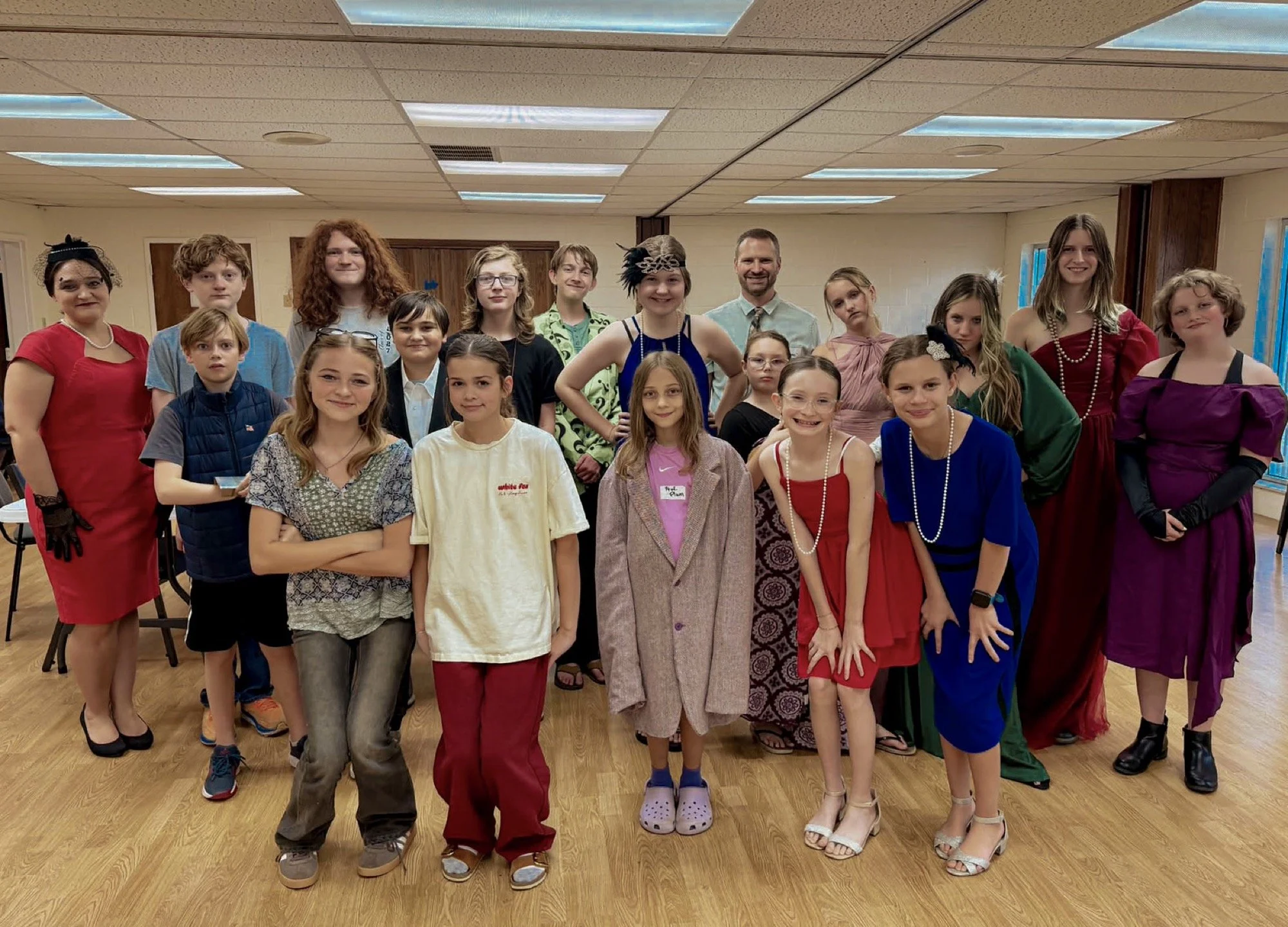 NEF Youth students and leaders in costume at the Clue-themed Late Night