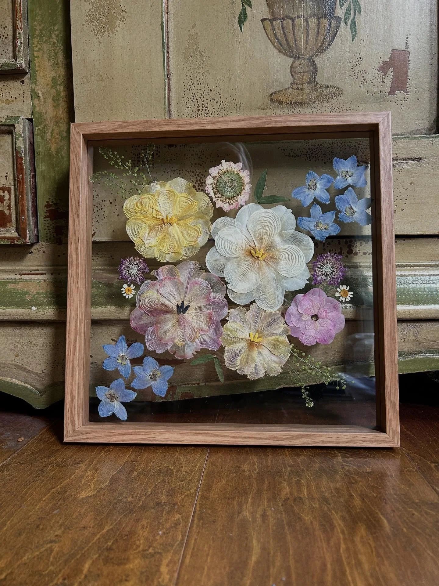 Not feeling traditional? Eccentric designs are always an option! 

Tier 1, 12 x 12 oak floating frame