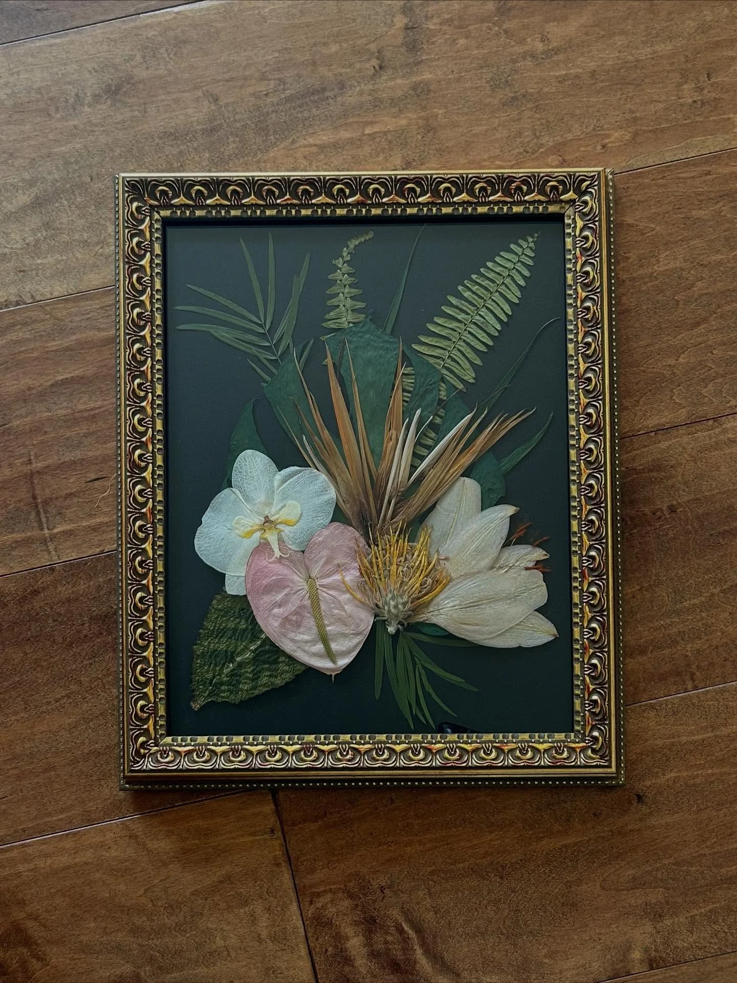 Which flower frame was old and which was new?Hard to tell with professional restoration 😉

I&rsquo;m extremely proud of this project, as it encompassed two of the most challenging feats in florals preservation: tropic bouquets, and dried out bouquet