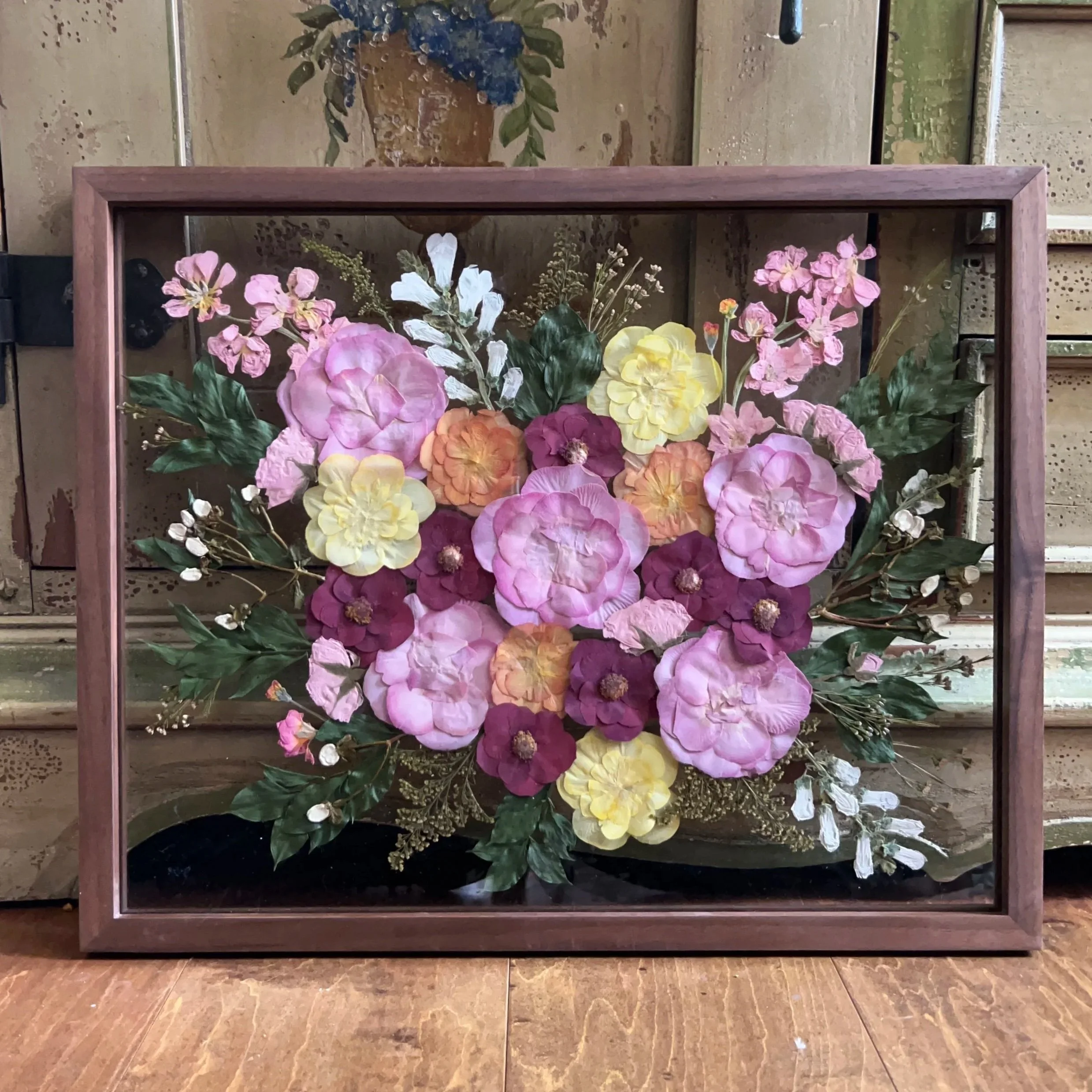 Pressed Flowers in a frame featuring wedding bouquet preservation