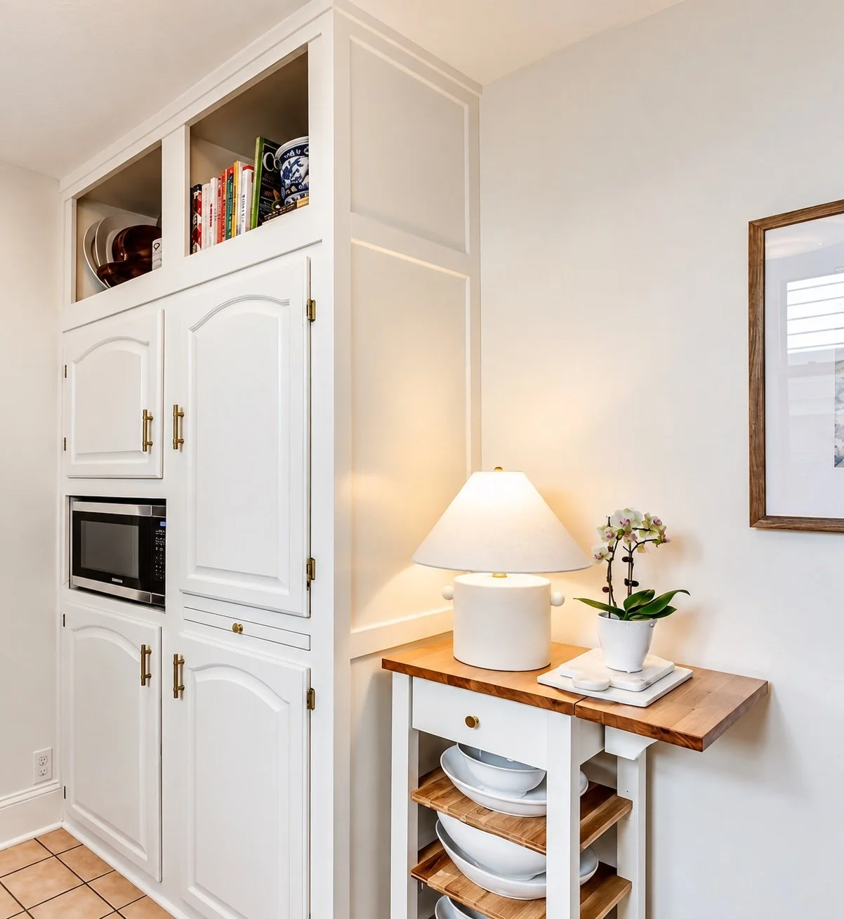 Cozy White Kitchen Nook with Orchid.jpg