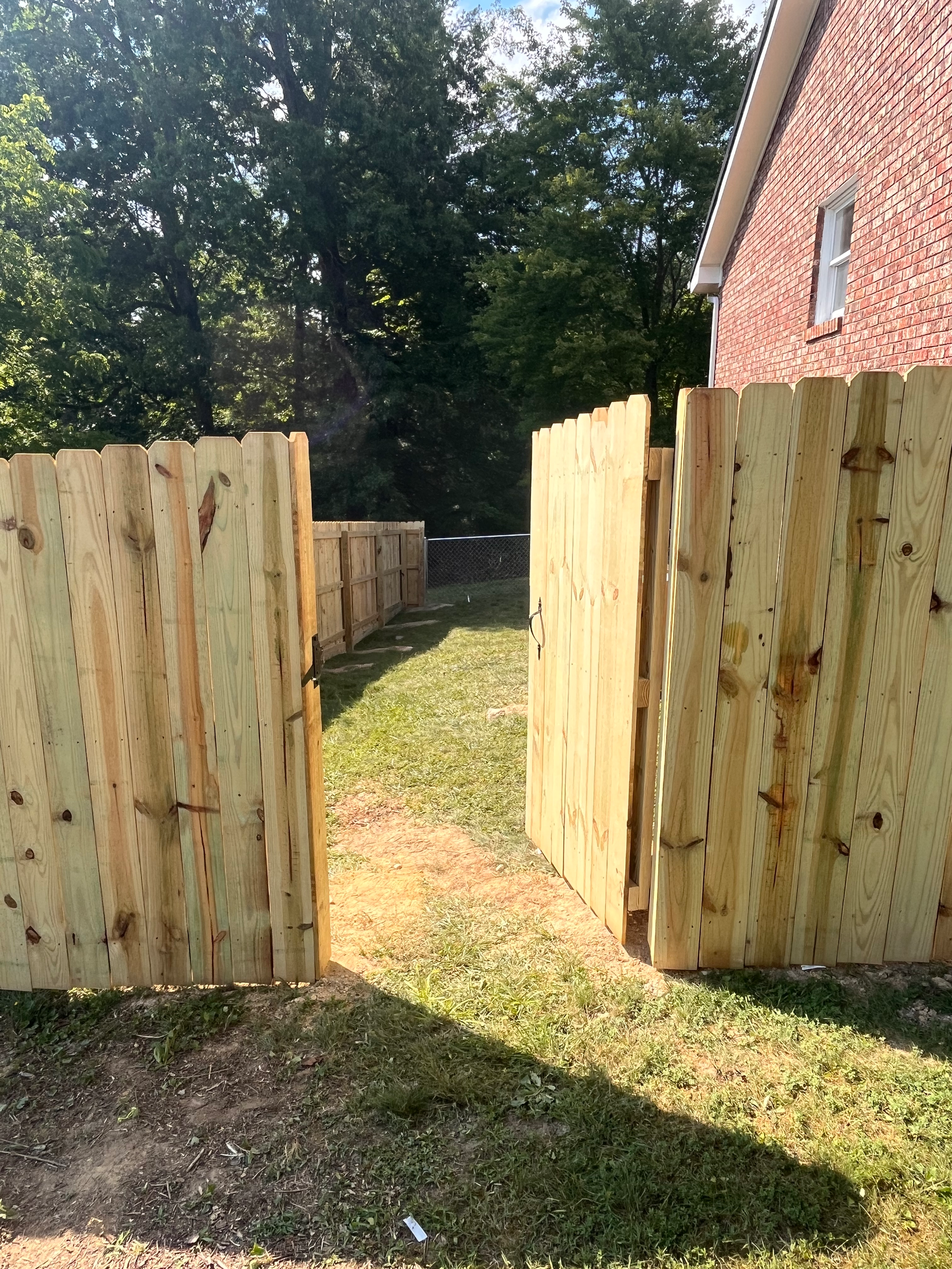 wooden privacy fence with custom door