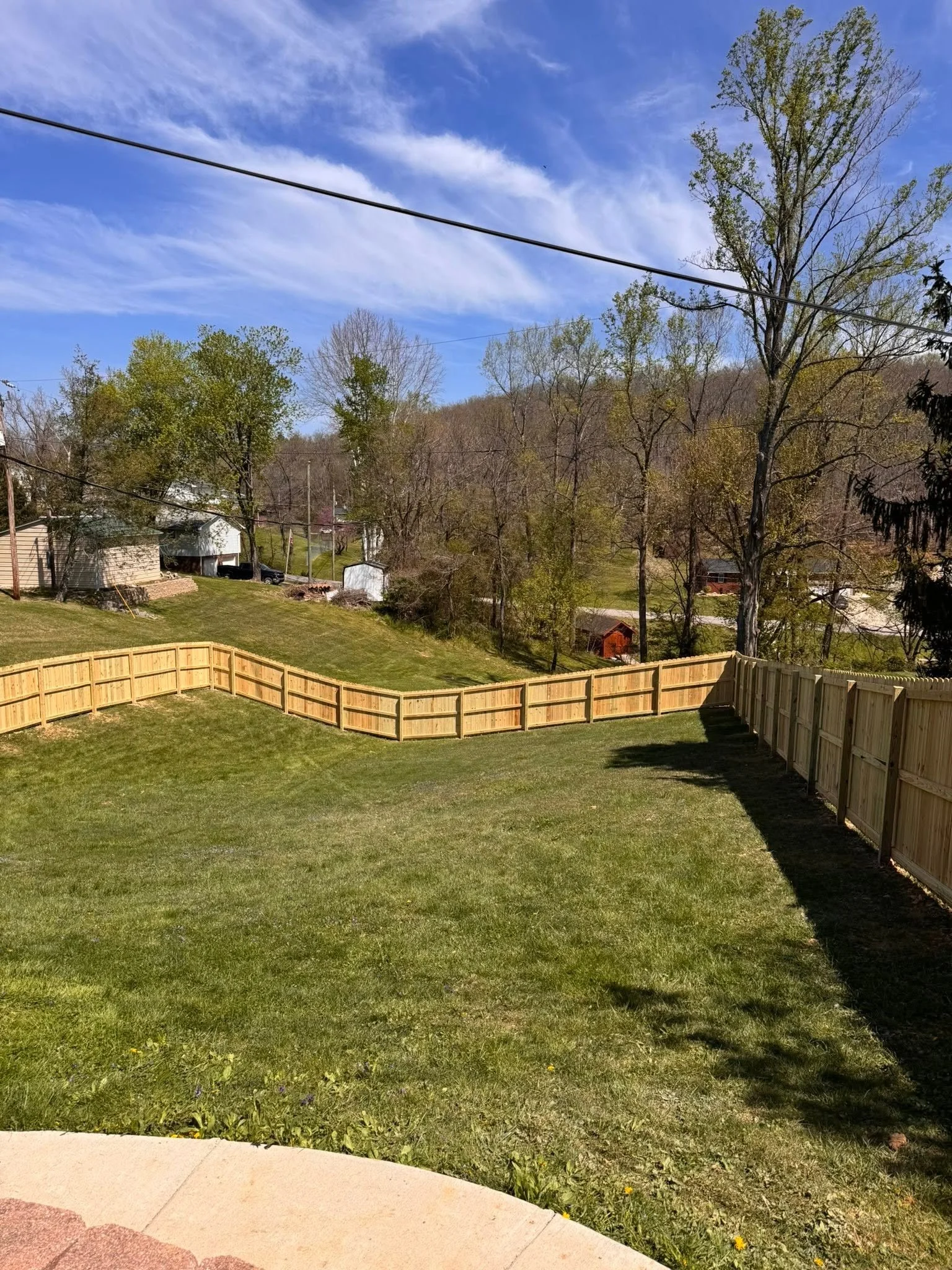 Wooden privacy fence in backyard