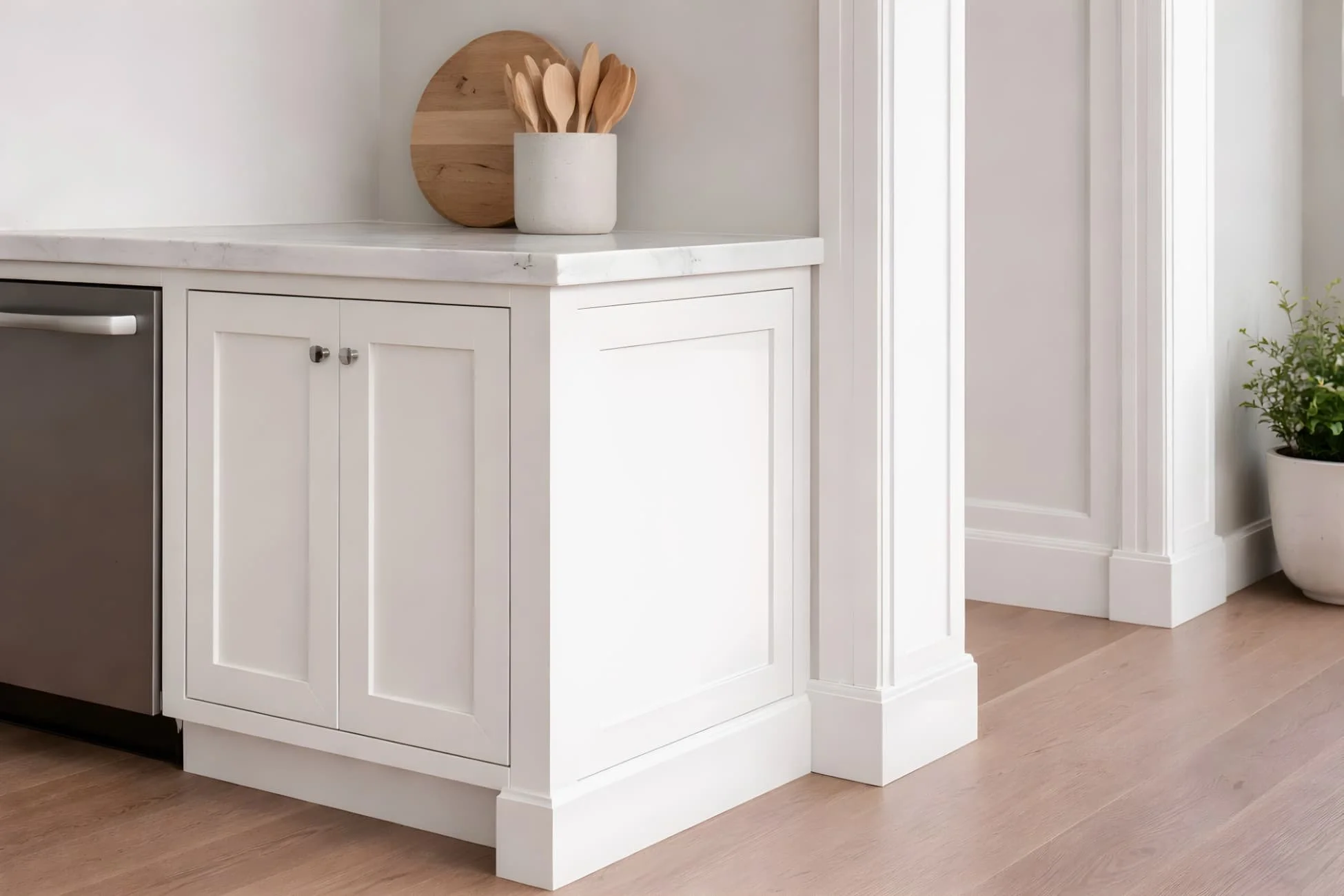 Cabinet run termination detail with clean wall transition and balanced filler spacing