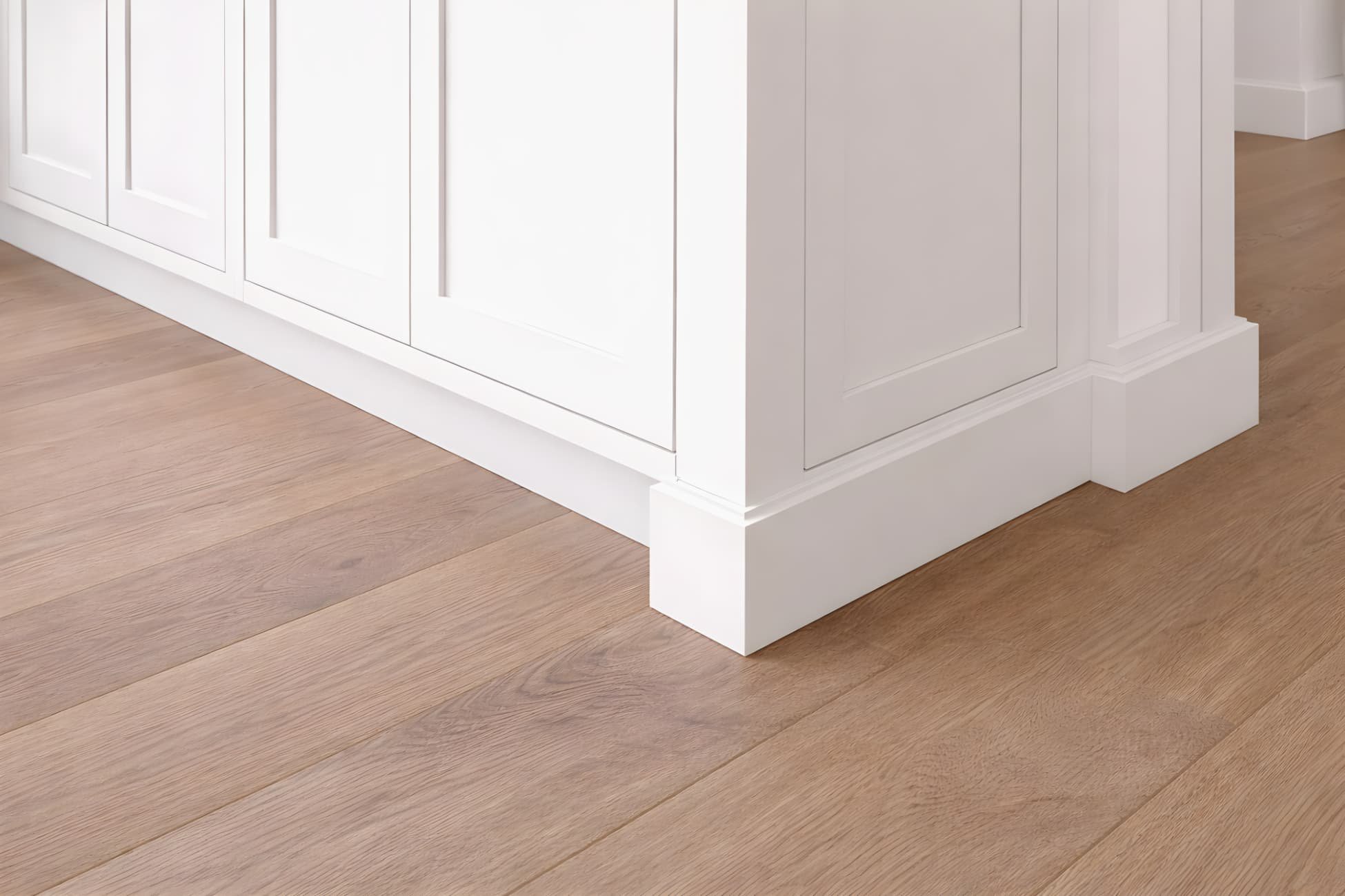 Toe-kick return detail showing a clean cabinet-to-flooring transition