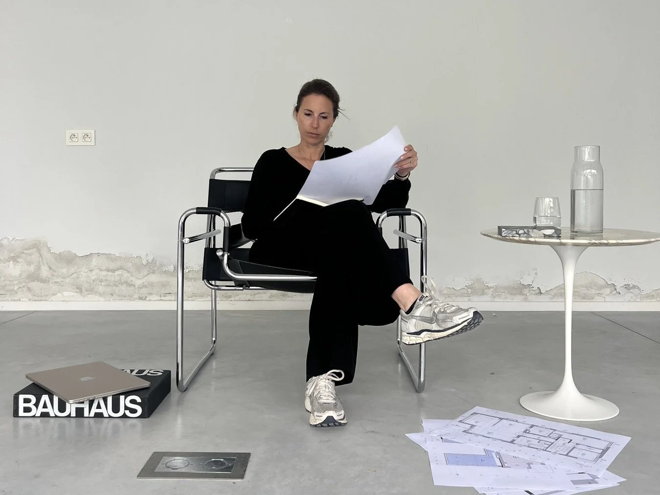 Architect Julie Palma Engels reviewing plans before an architecture jury