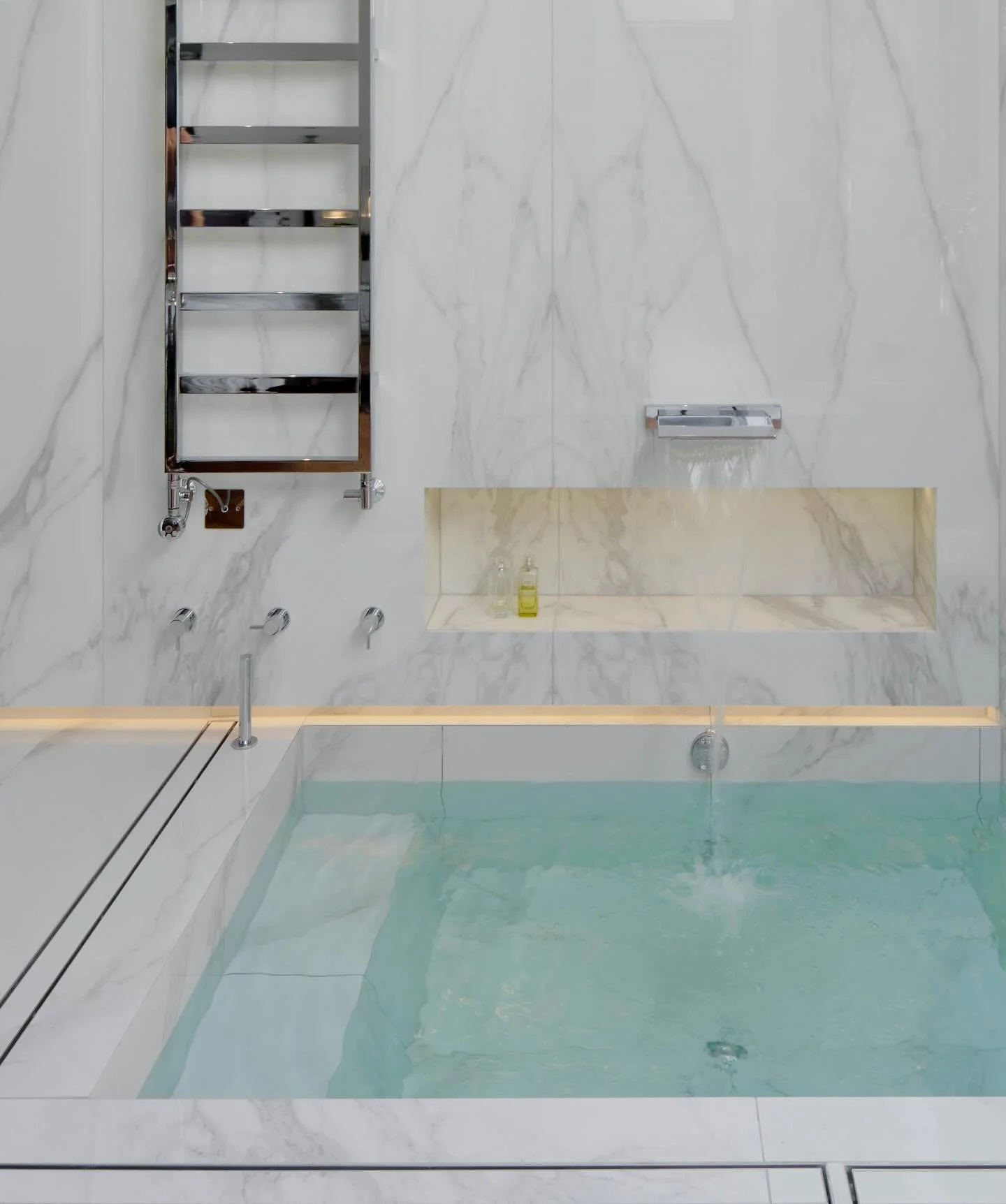 A tranquil place to unwind: we created a sunken bath in the principal bedroom suite of one of our Chelsea mews houses.

Behind the finished images was a complex process to get the details right. We first modelled it in 3D CAD then coordinated with th