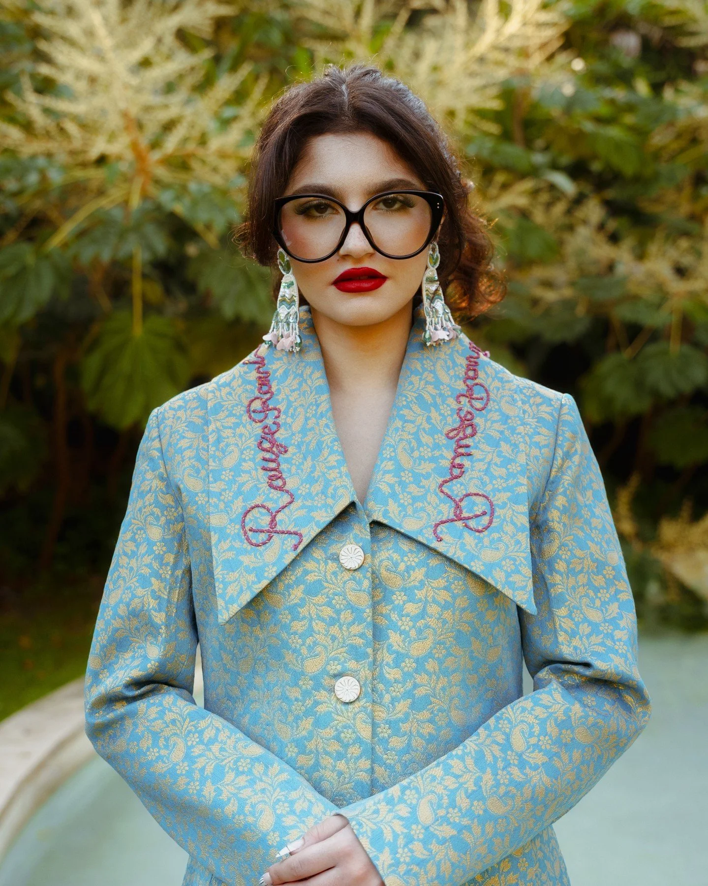 Look at the power of quiet dominance.

It is the texture of a vision realized: where the precision of a tailored collar meets the ancestral design of sky-blue silk.

She carries herself with style in its most potent form, reflecting the composure of 