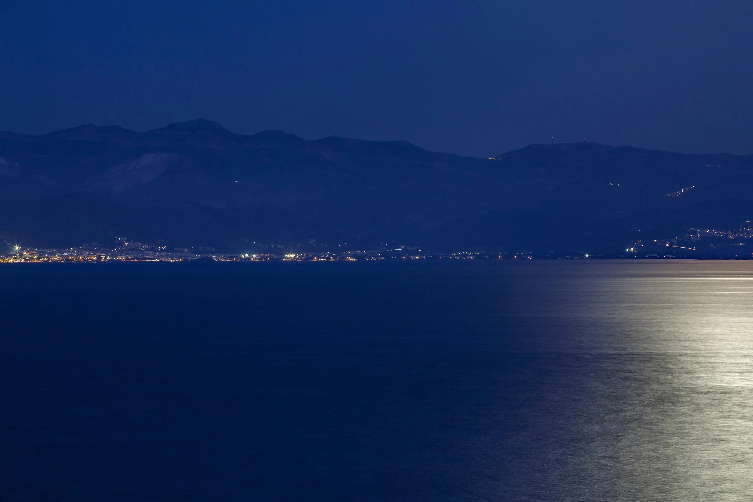 V2.33 naxos by night from stunning villa in paros.jpg