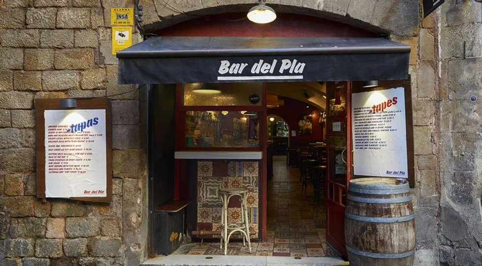  Bar del Pla  

  Cozy, no frills tapas bar. Less touristy and more delicious than the tapas spots serving dishes from under a heat lamp. 

  J :  Best place to be adventurous and try different kinds of seafoods! I was skeptical about ordering fried 