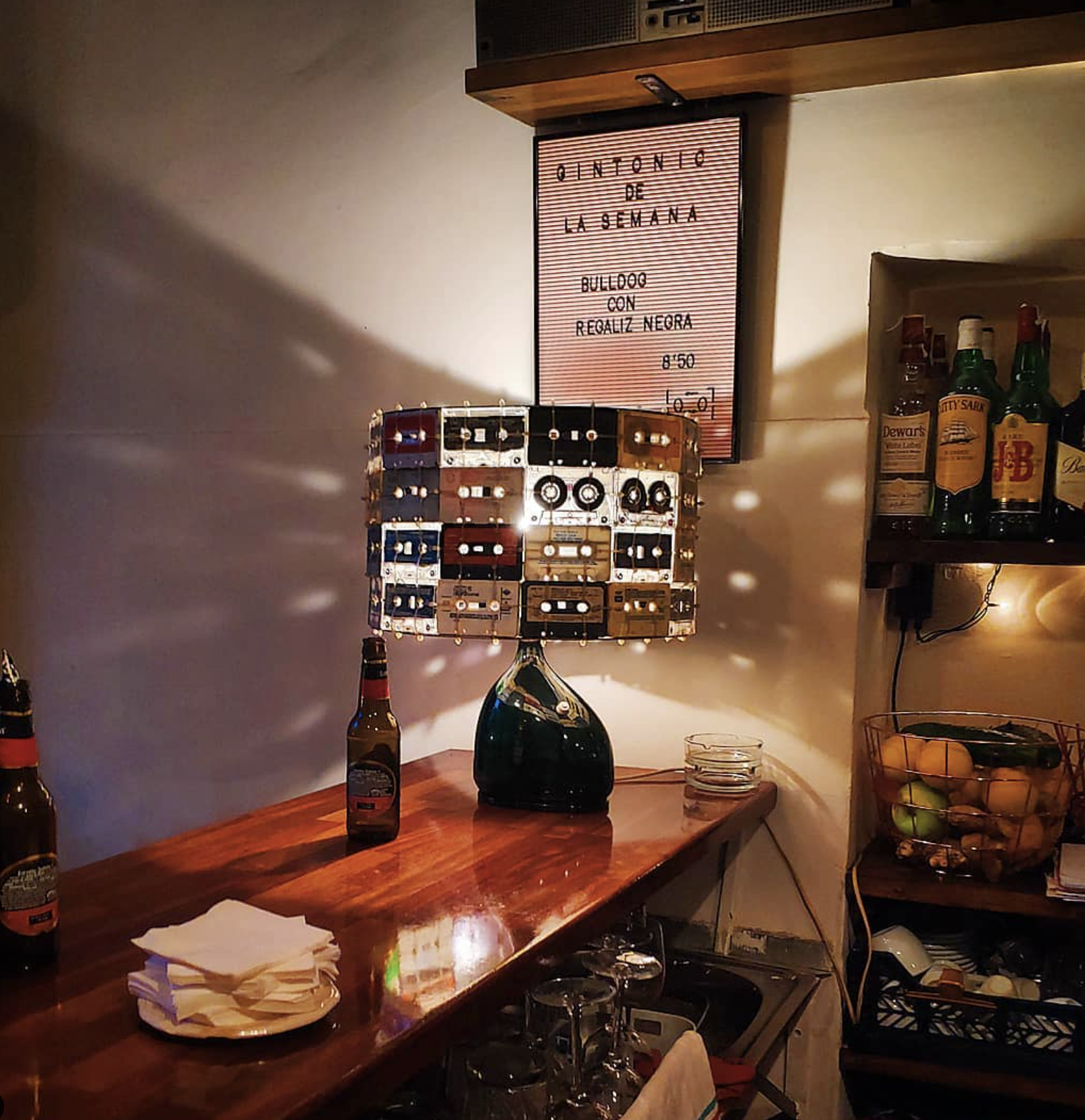  Casette Bar   

  Fun neighborhood bar with small bites and an extensive gin & tonic selection.  

   J : Get the fried squid sandwich and an orange & clover gin and tonic!   
   P :  The fried squid on toasted ciabatta is sooo crispy and delicious 