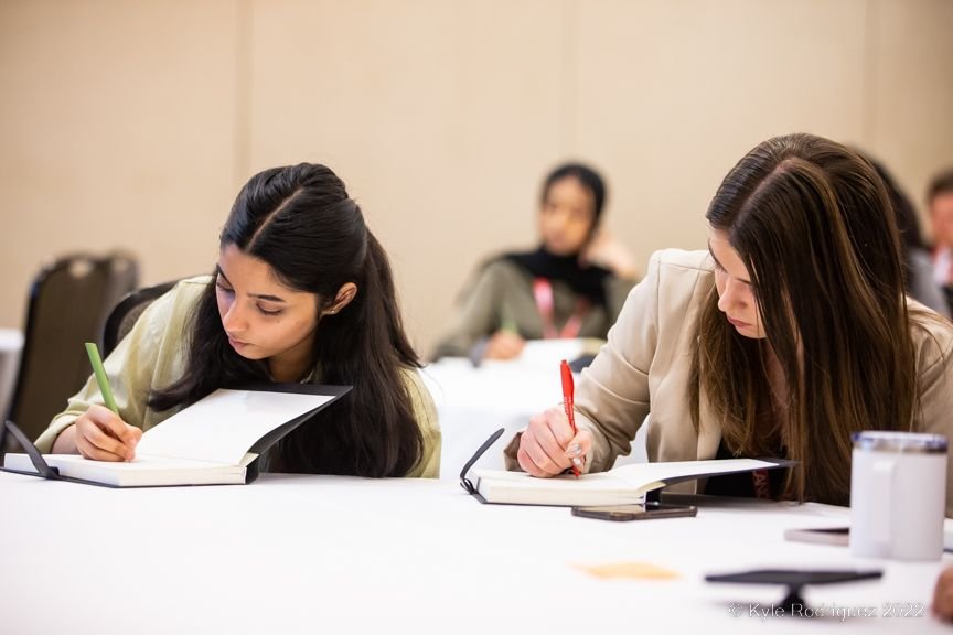 LSC-2022-friday-two-delegates-taking-notes-at-workshop.jpeg