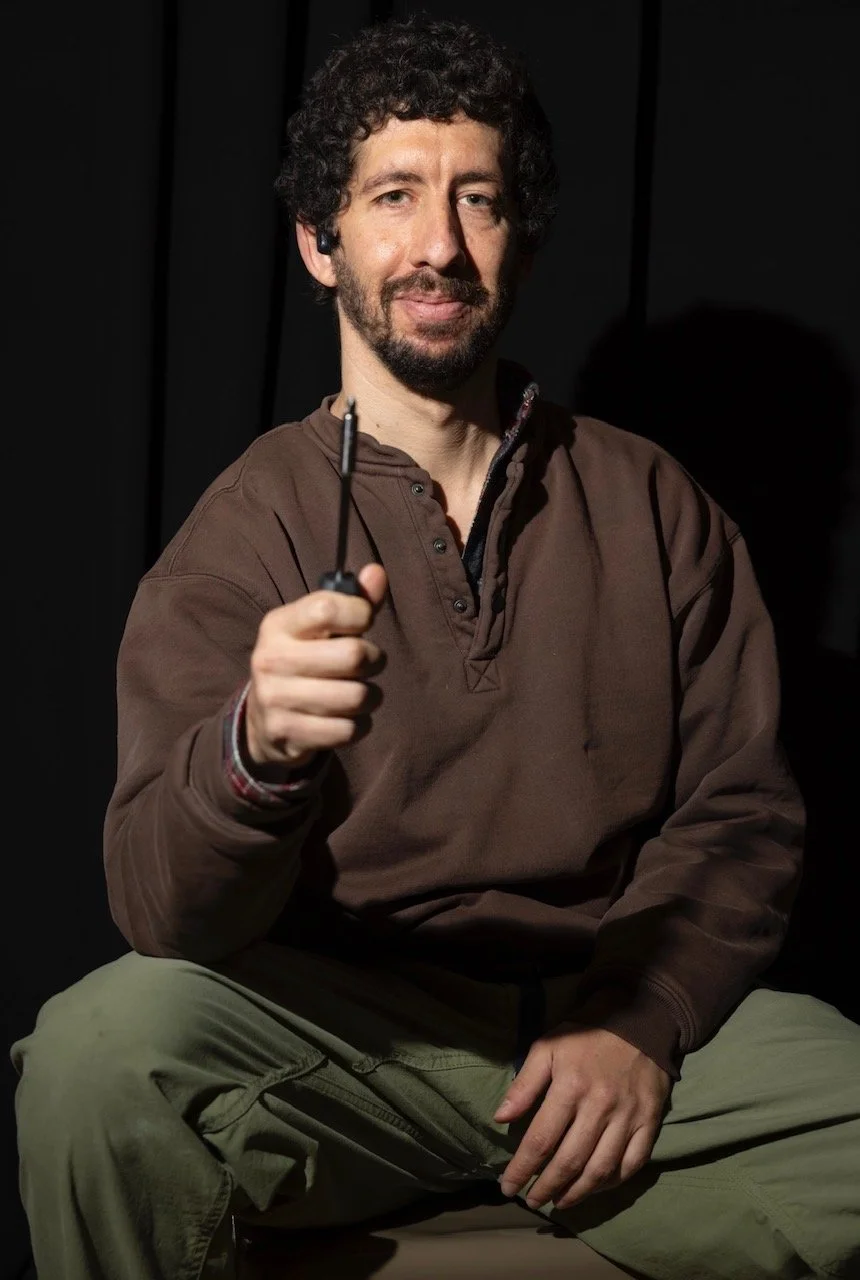 Alec Stein Director Of Operations At Repair Cafe El Barrio Holding A tool