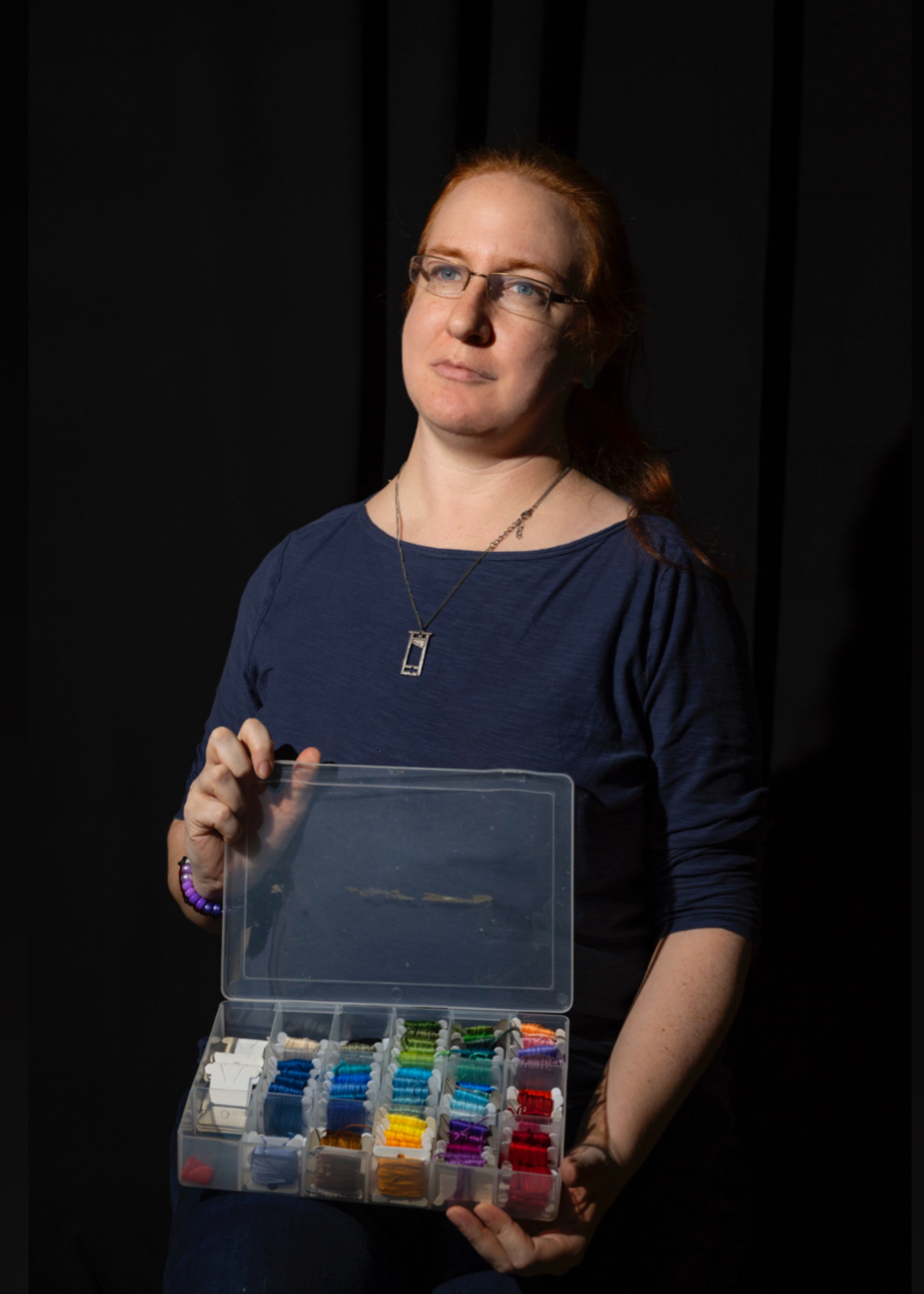 Susan Graves, volunteer at Repair Café El Barrio, using the serger