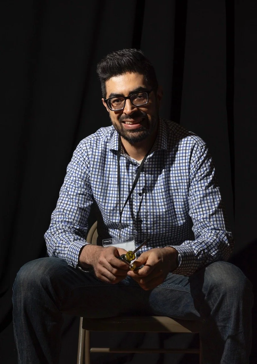 A.J Sandoval repair coach at Repair Cafe El Barrio holding a tool