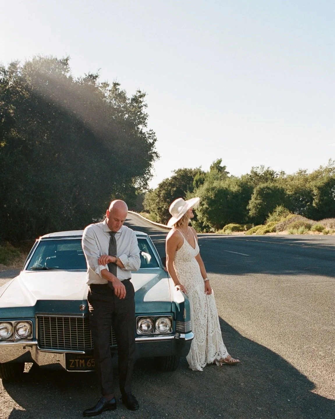 Claire and Daniel, before their commitment ceremony with their vintage car and down the street at the dive, shot all on film!