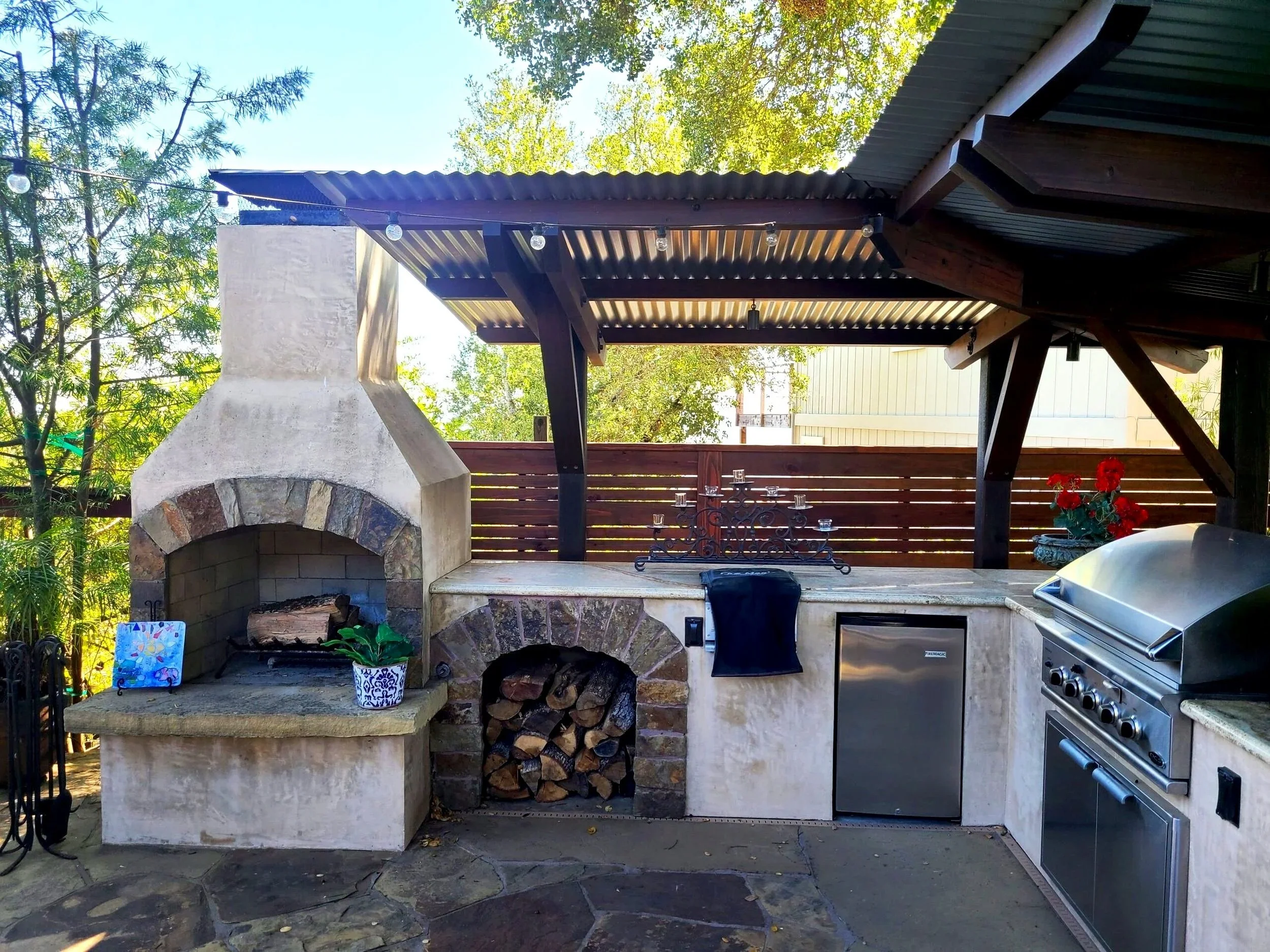 Covered Outdoor Kitchen with Pizza Oven and BBQ