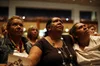 Louise, Marjorie and Sylvia, part of the Stolen Generation holding a photograph of their parents as Prime Minister Kevin Rudd delivers the Apology to the Stolen Generations at Parliament House, Canberra, 13 February 2008 / Louise Whelan