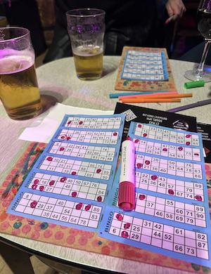 A formica table with pints of lager and bingo cards at Walthamstow's famous Trades Hall community space
