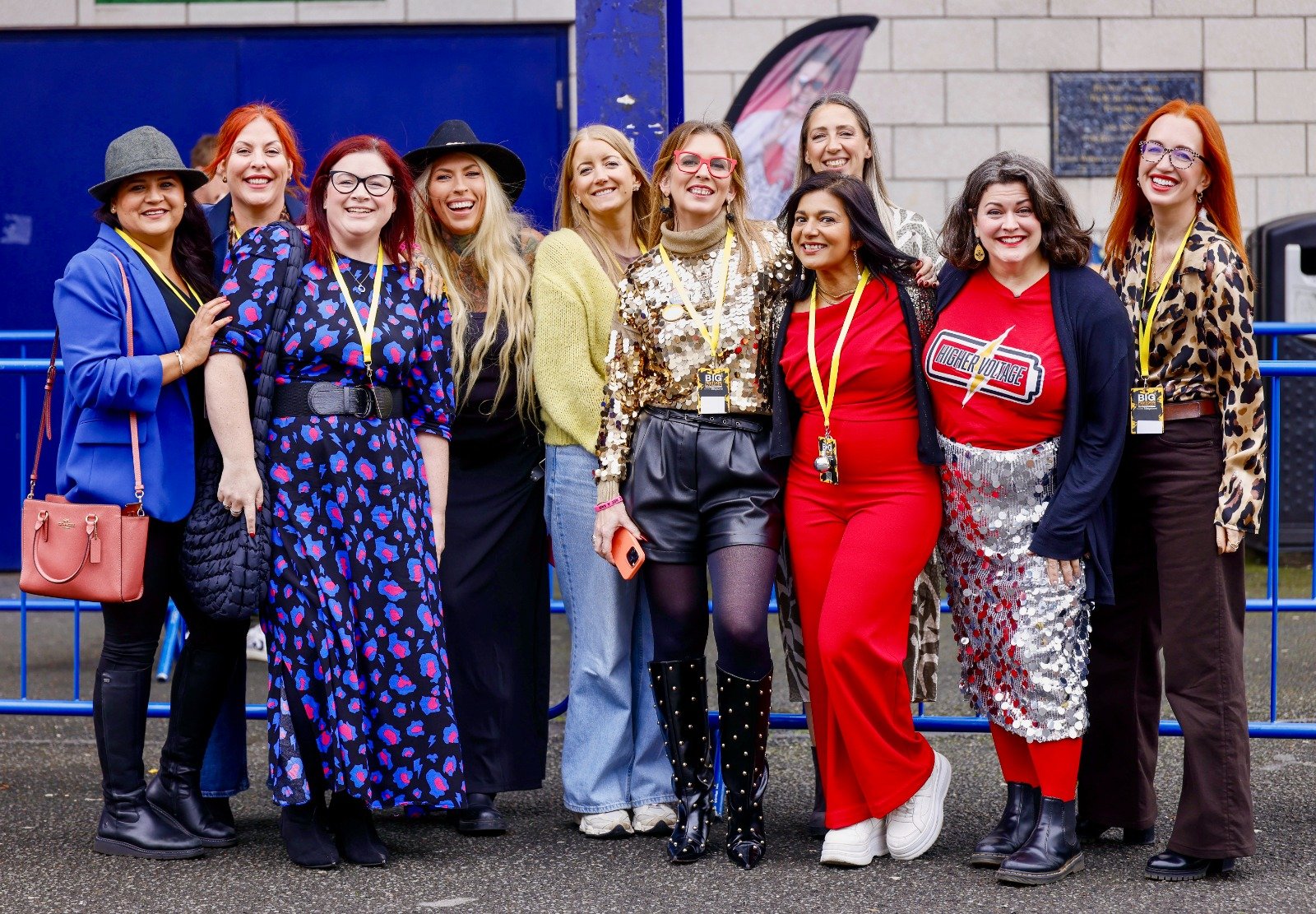 Lea Turner founder of The HoLT community and some members gathered together smiling