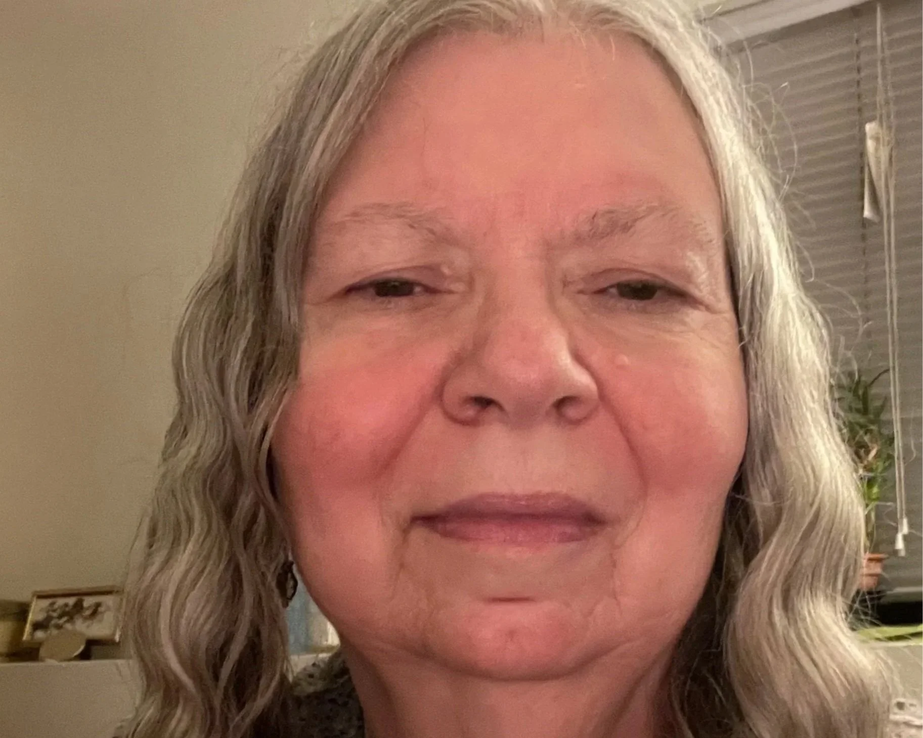 janet roper animal communicator elder white woman with beautiful flowing wavy gray hair
