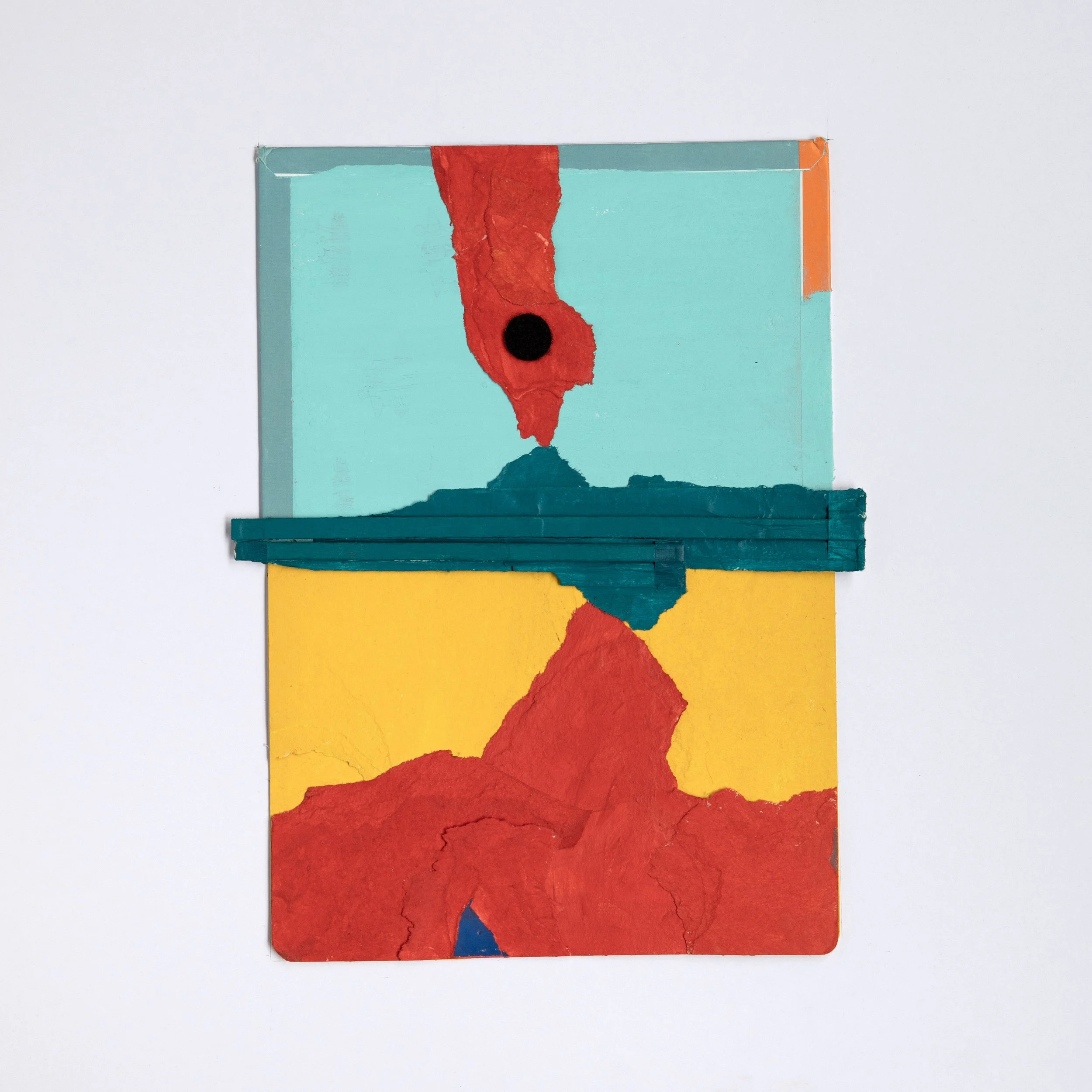 18 by 18 inch mixed media artwork; central focus is an open book cover laid flat, all the pages removed from its spine. Scraps have been painted in primary colors to create an abstract landscape with shades of turquoise, red, yellow, and blue.