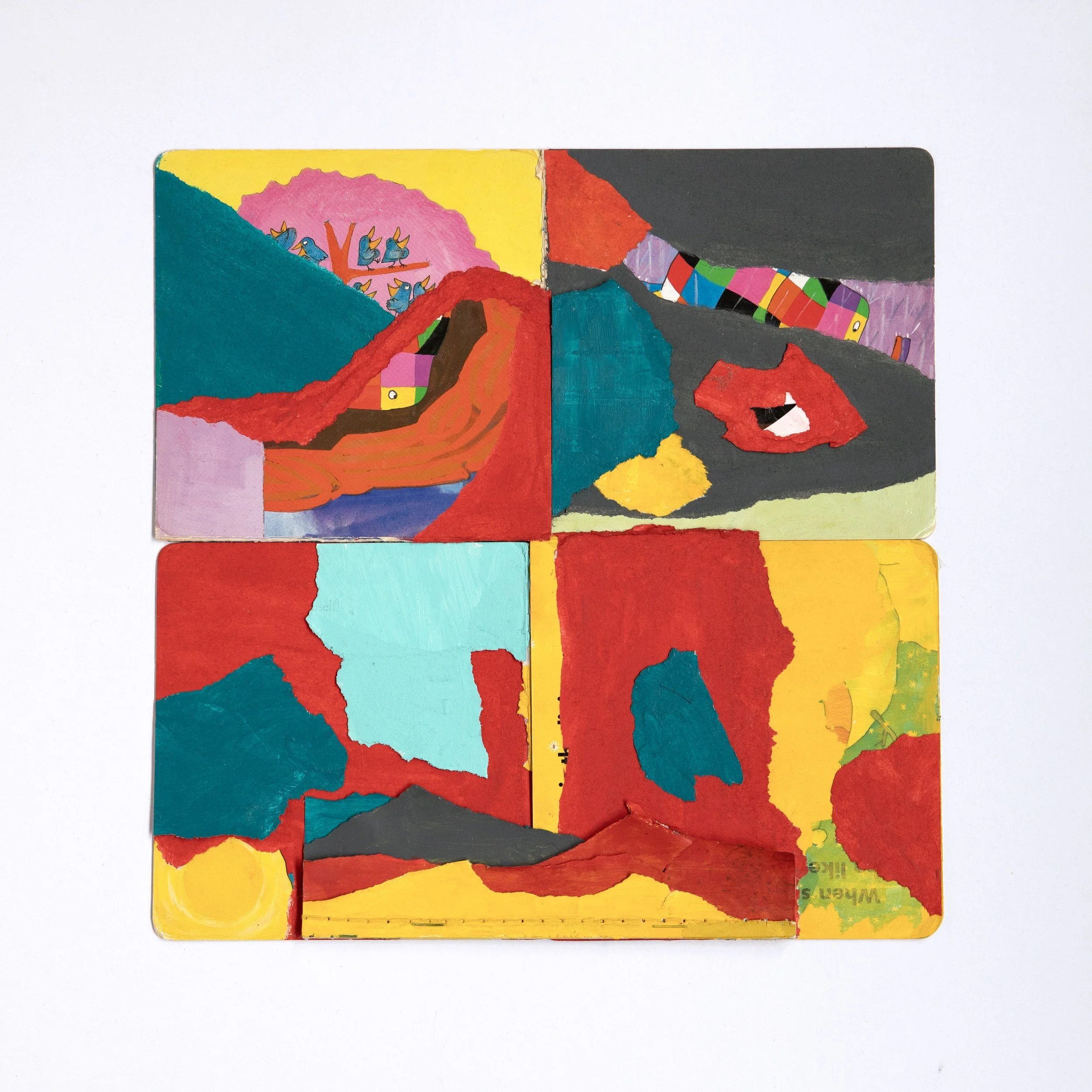 18 by 18 inch mixed media collage made from the pages of 4 square board books, which are painted with primary shades and arranged together artfully for a a colorful, abstract object shot through with rich pure colors, with red and yellow dominating.