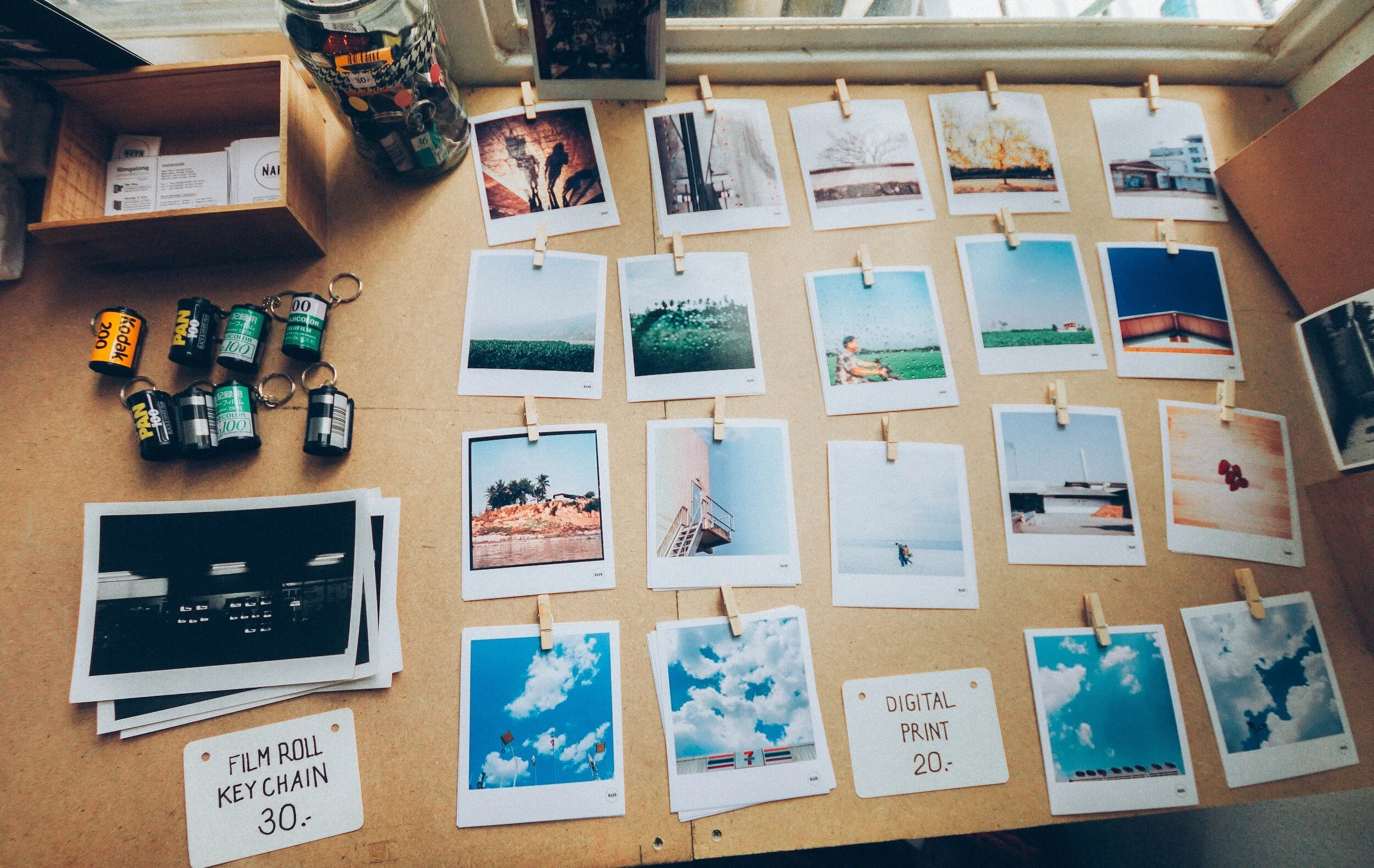 vacation photos pinned on a bulletin board