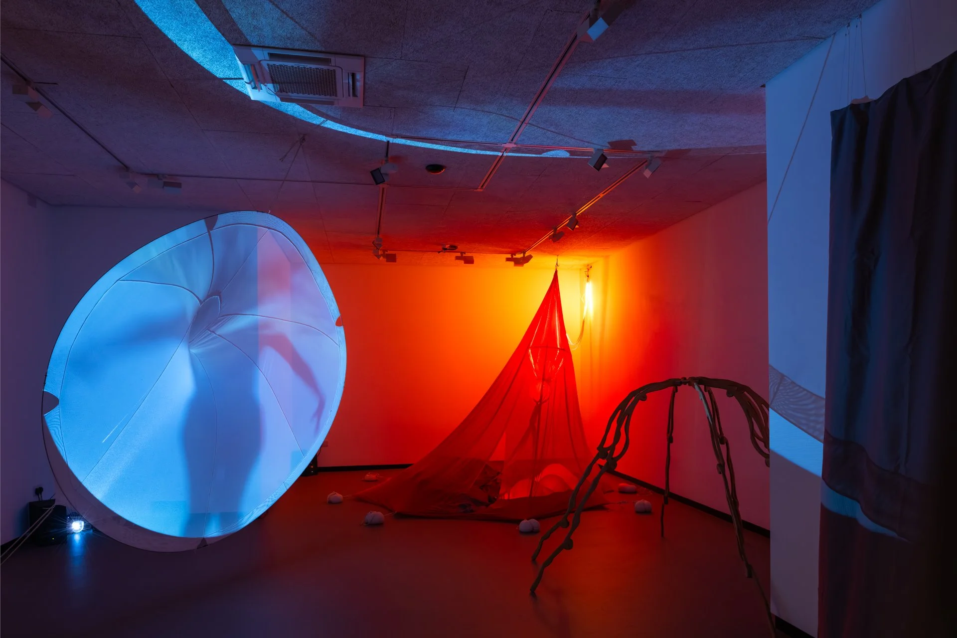NOT NOT EGGS immersive installation by artist Roosa Tulvio consisting of a projection membrane, tent and a spider like structure