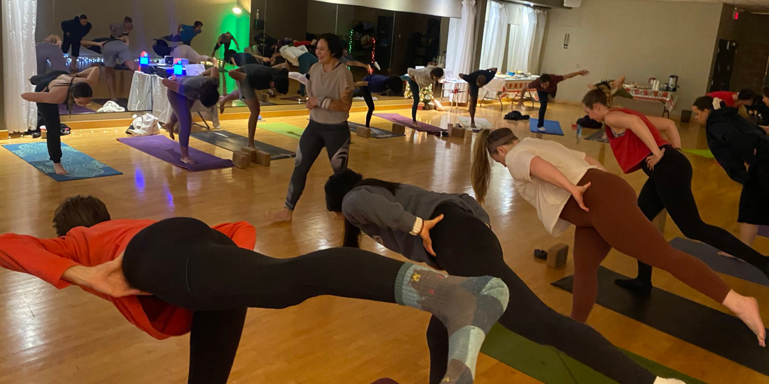Alana led a yoga class at the Rocket Holiday Party