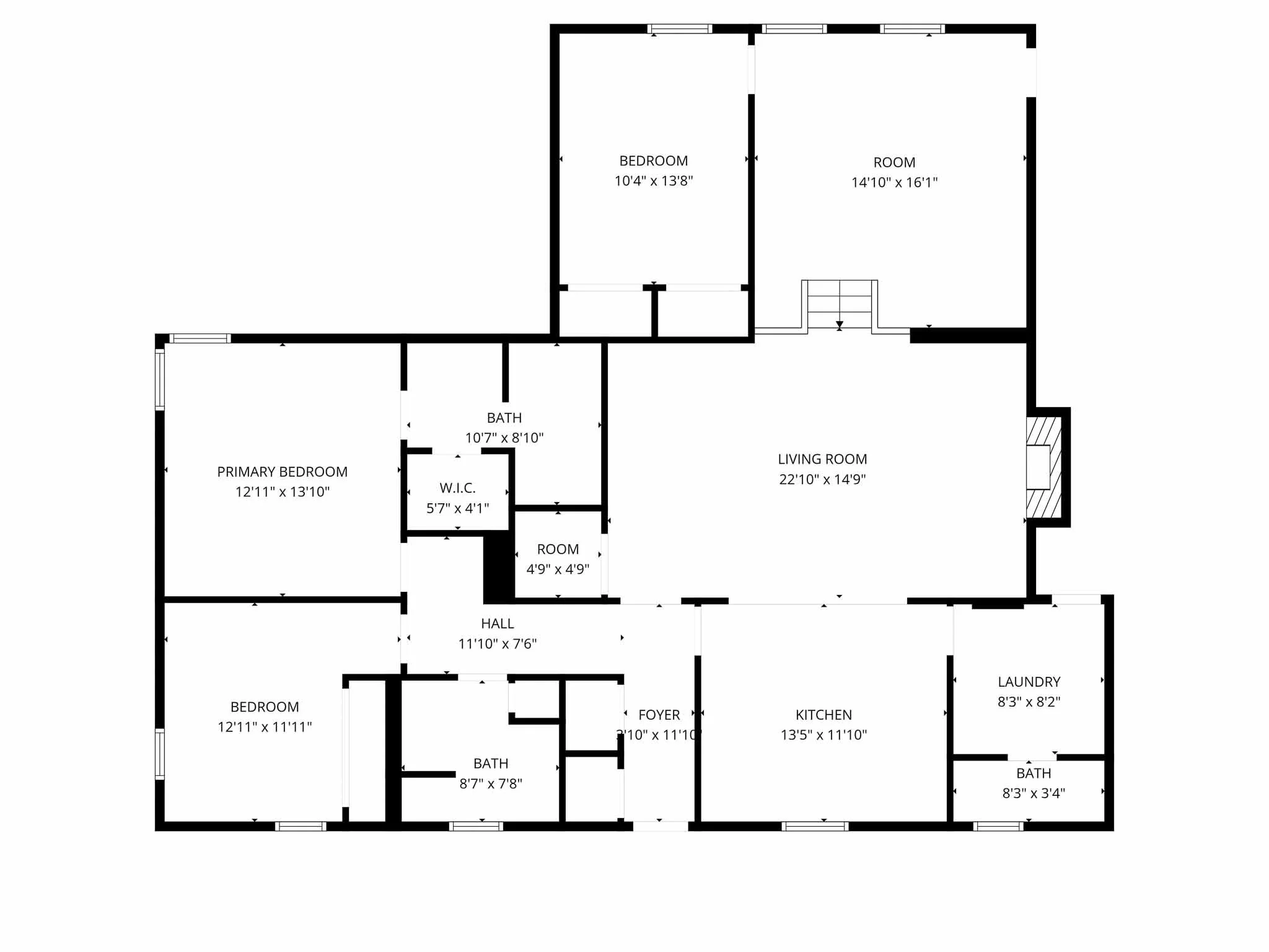 Floor plan of a house with labeled rooms including two bedrooms, two bathrooms, a laundry room, a kitchen, a living room, a primary bedroom with an ensuite bathroom and walk-in closet, additional rooms, and a foyer.