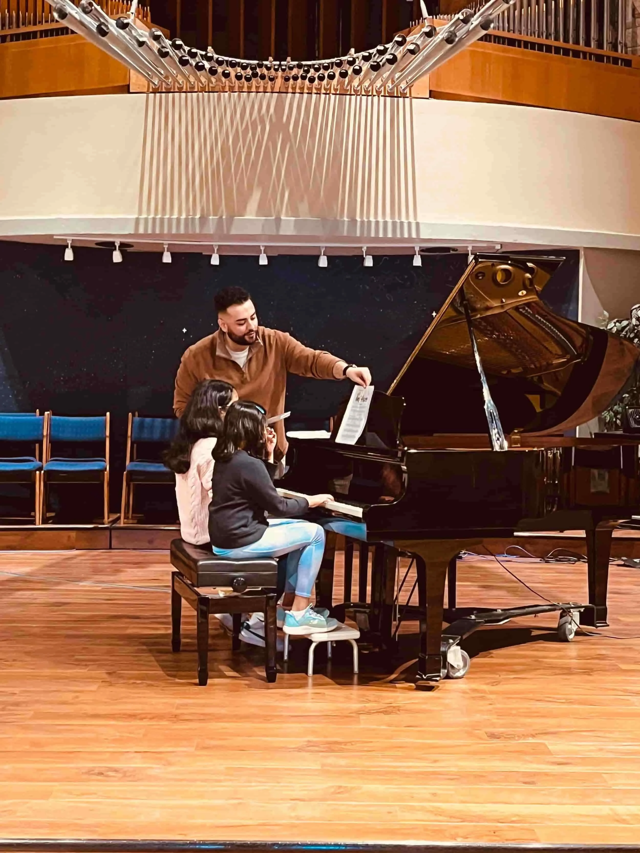 Ria and Shreya practicing at Naji Piano School