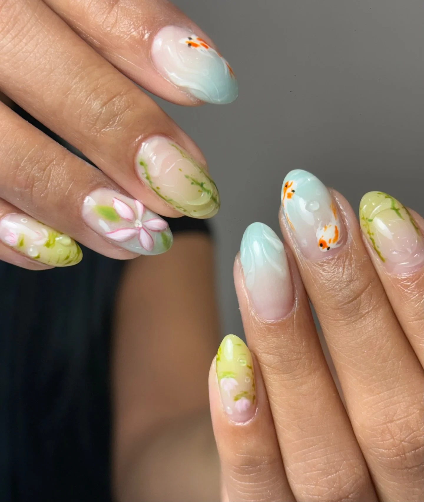 Nature-inspired nails 💦🌿🧡🐟🌿✨🌊

By Joy 😍
