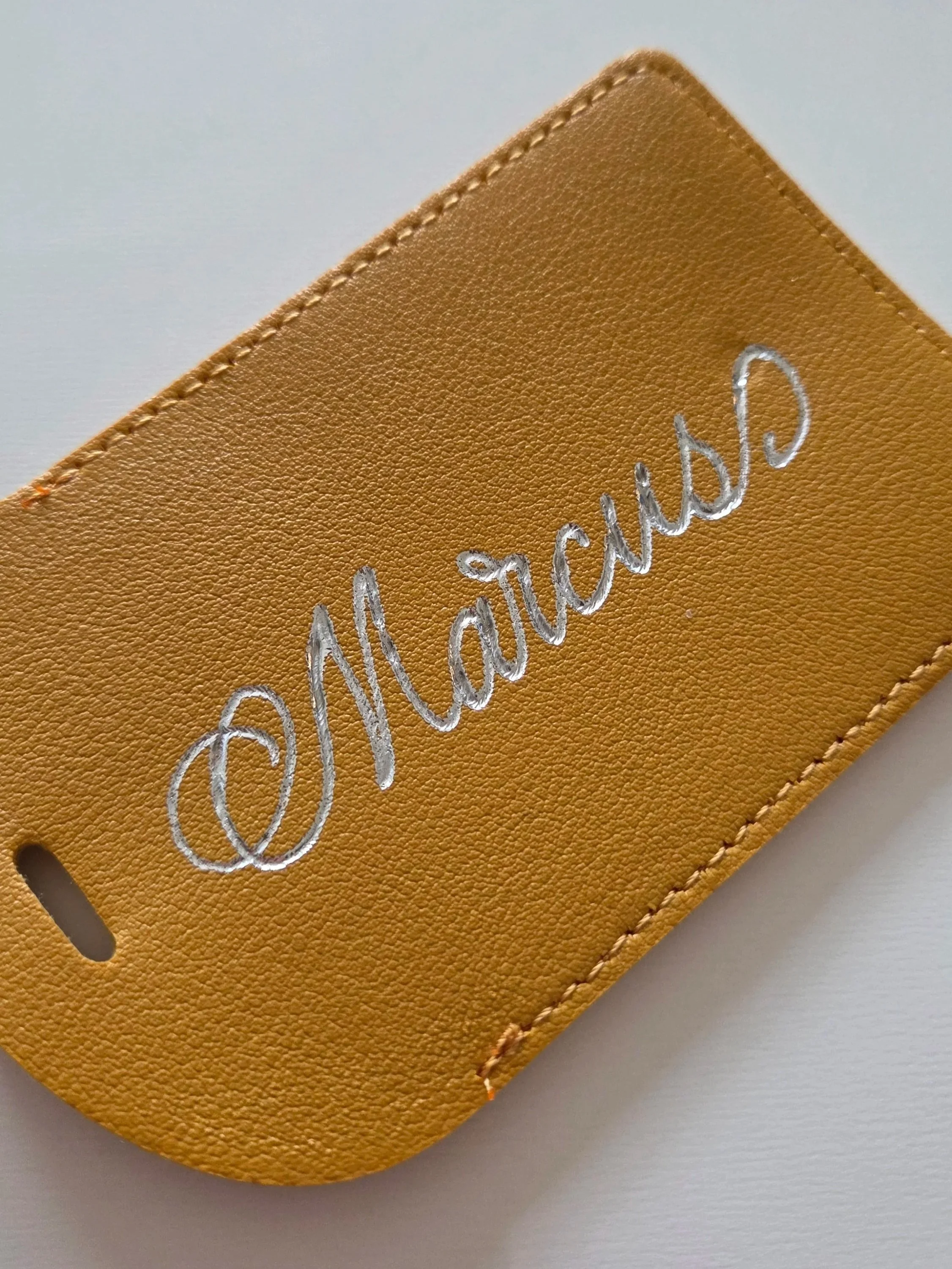 custom personalised with calligraphy heat foil on leather luggage tags
