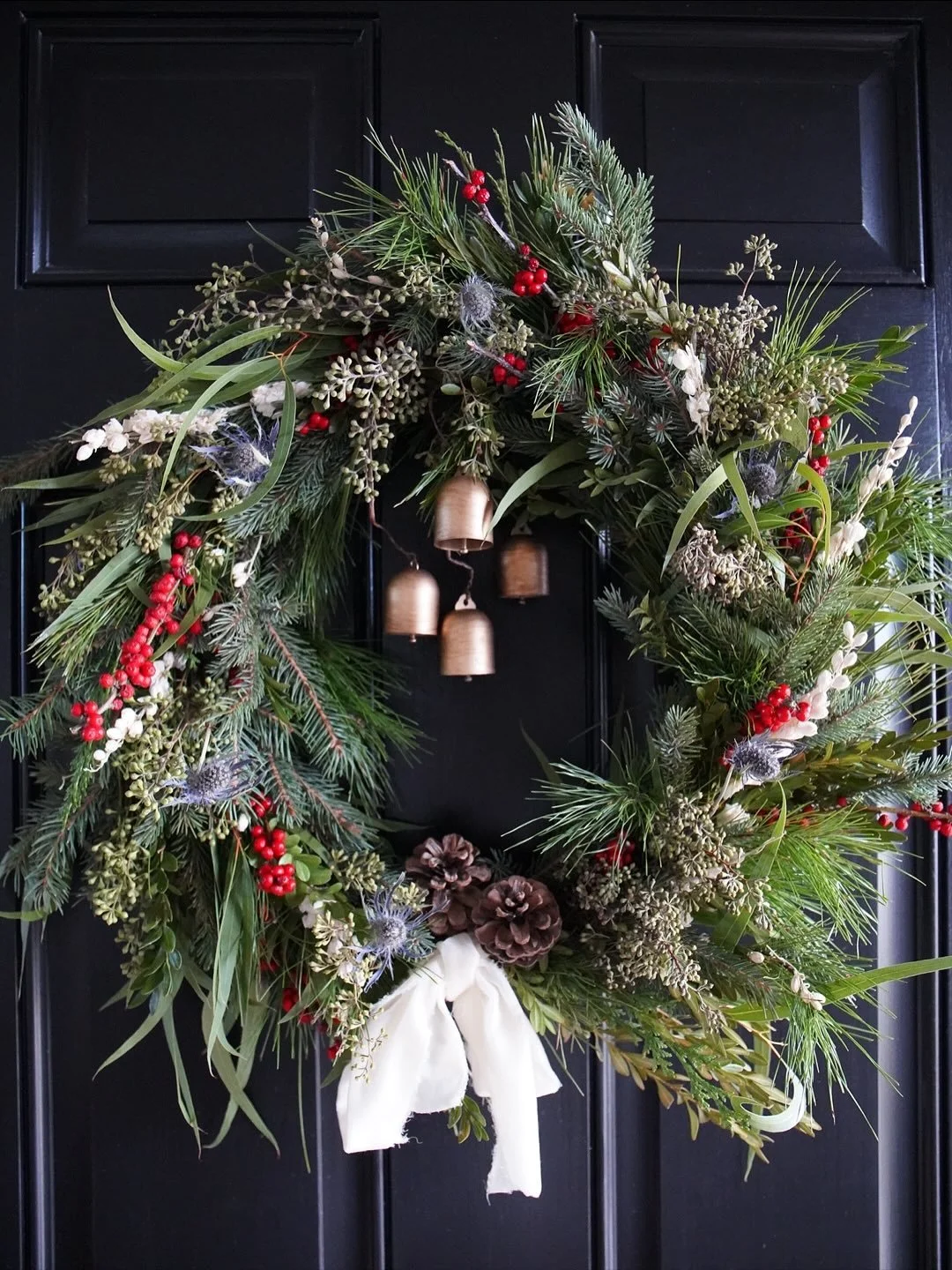 A little traditional, a little whimsical. 

#holidaywreath #christmasmagic #holidaycheer #holidaydecor #christmaswreath #wreath